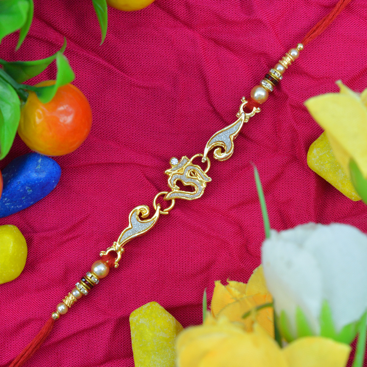 Glittery Om Rakhi with Pearls