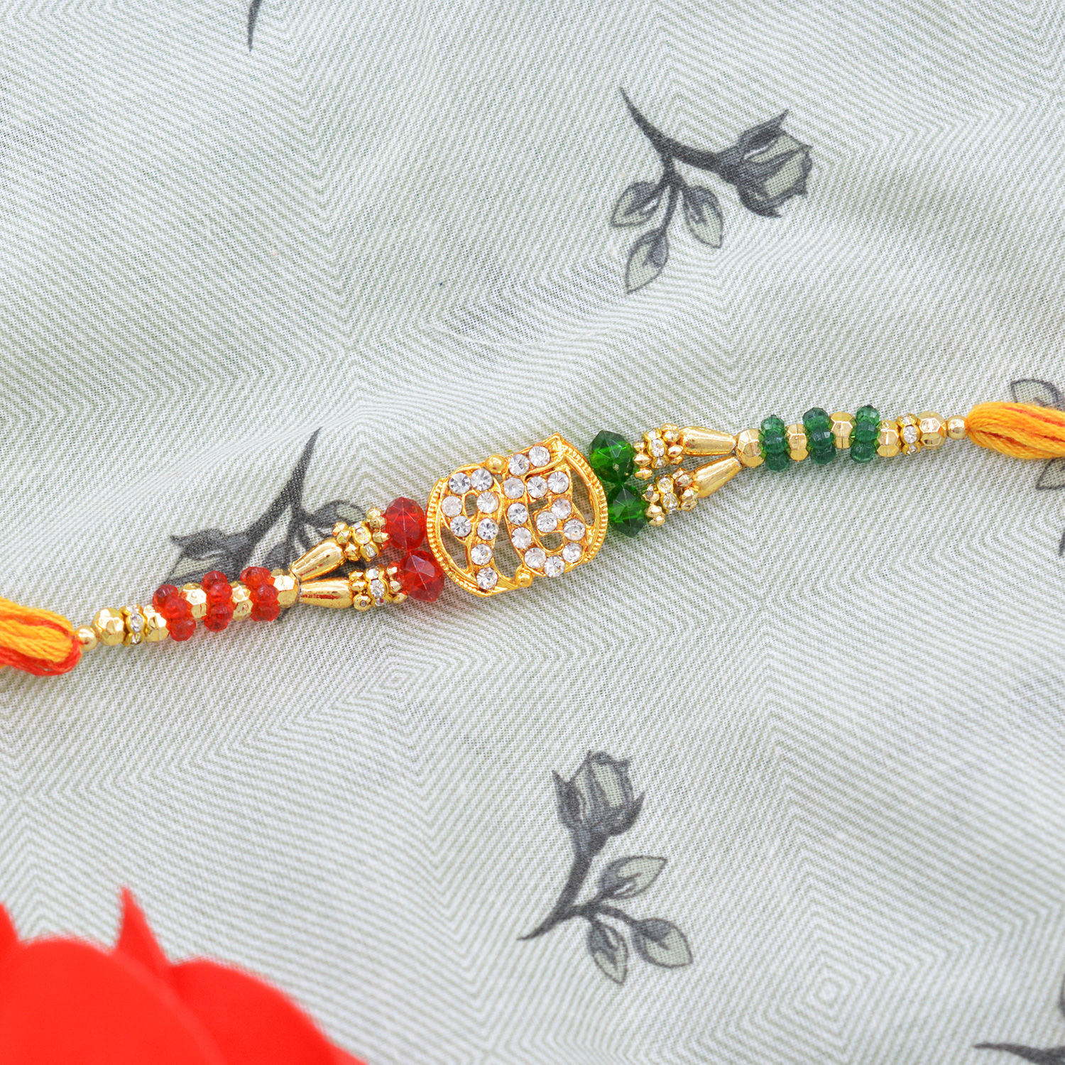 Amazing Onkar Rakhi with Multicolor Beads