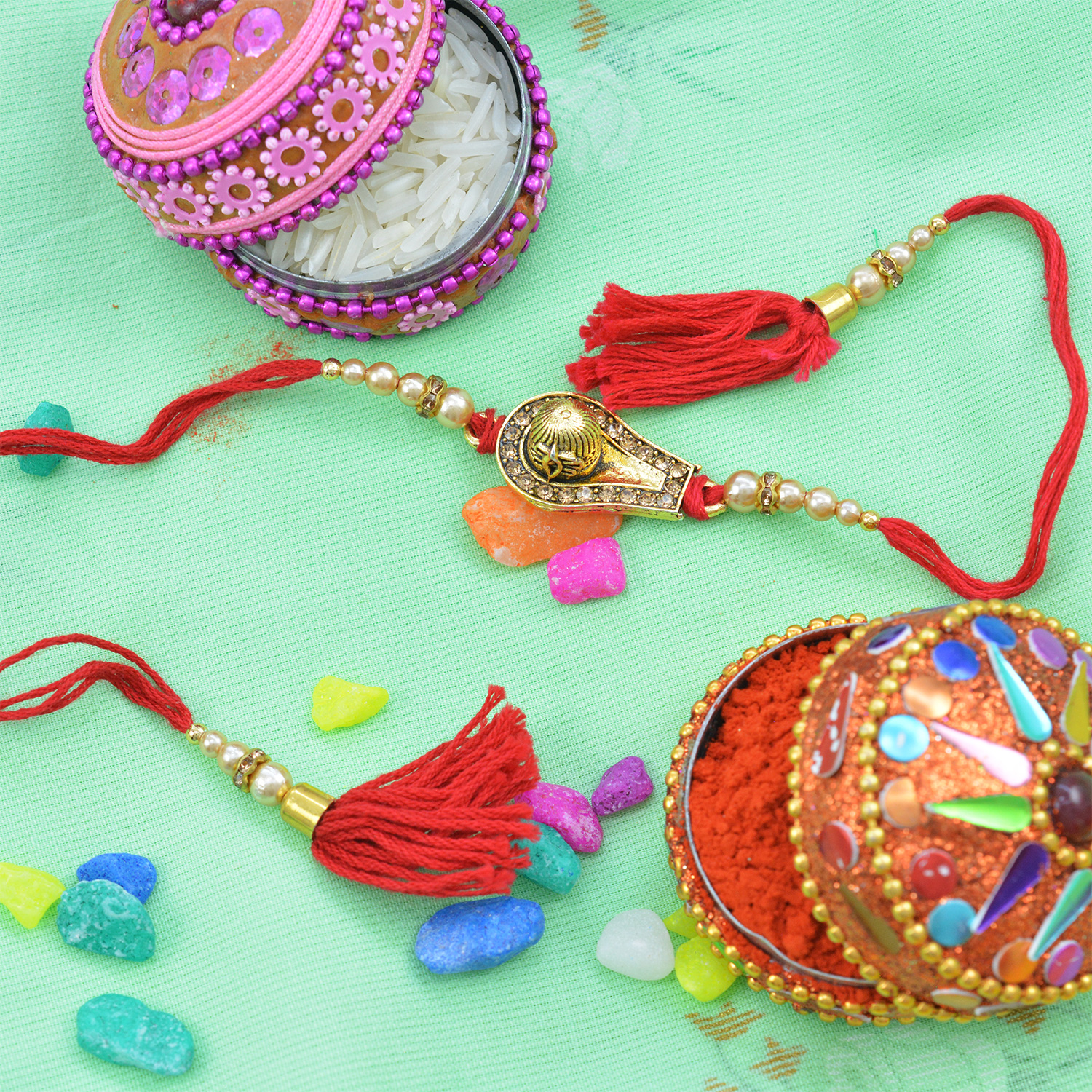 Shivling Designed Rakhi with Pearls in Mauli Dori