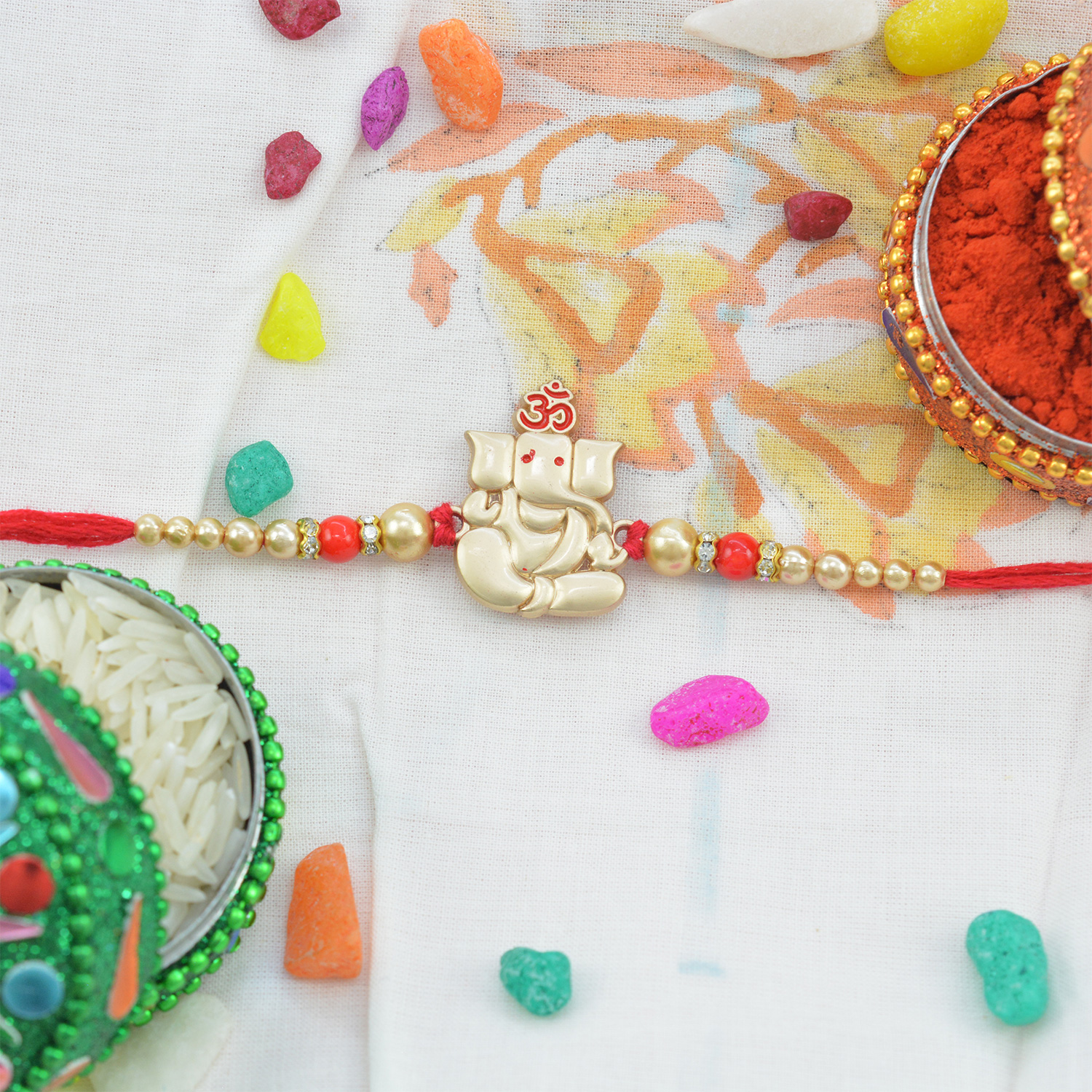 Beautiful Ganesha rakhi With Om and Pearls