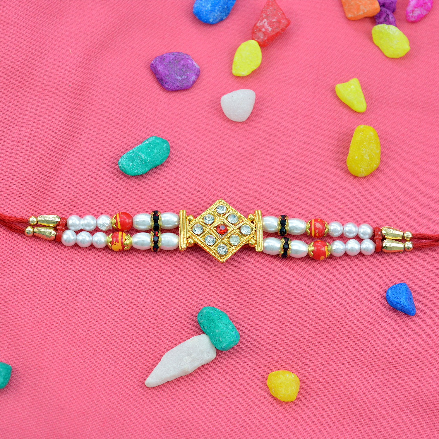 White Color plane Beads with Golden Diamond studded Beads Rakhi