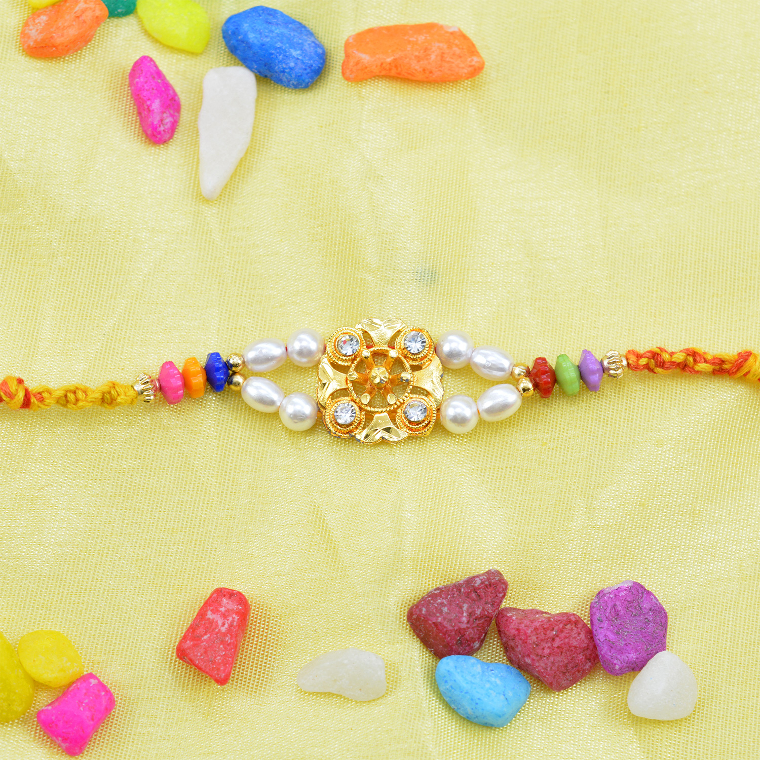 Golden Work Jewel and White Polished Beads Rakhi