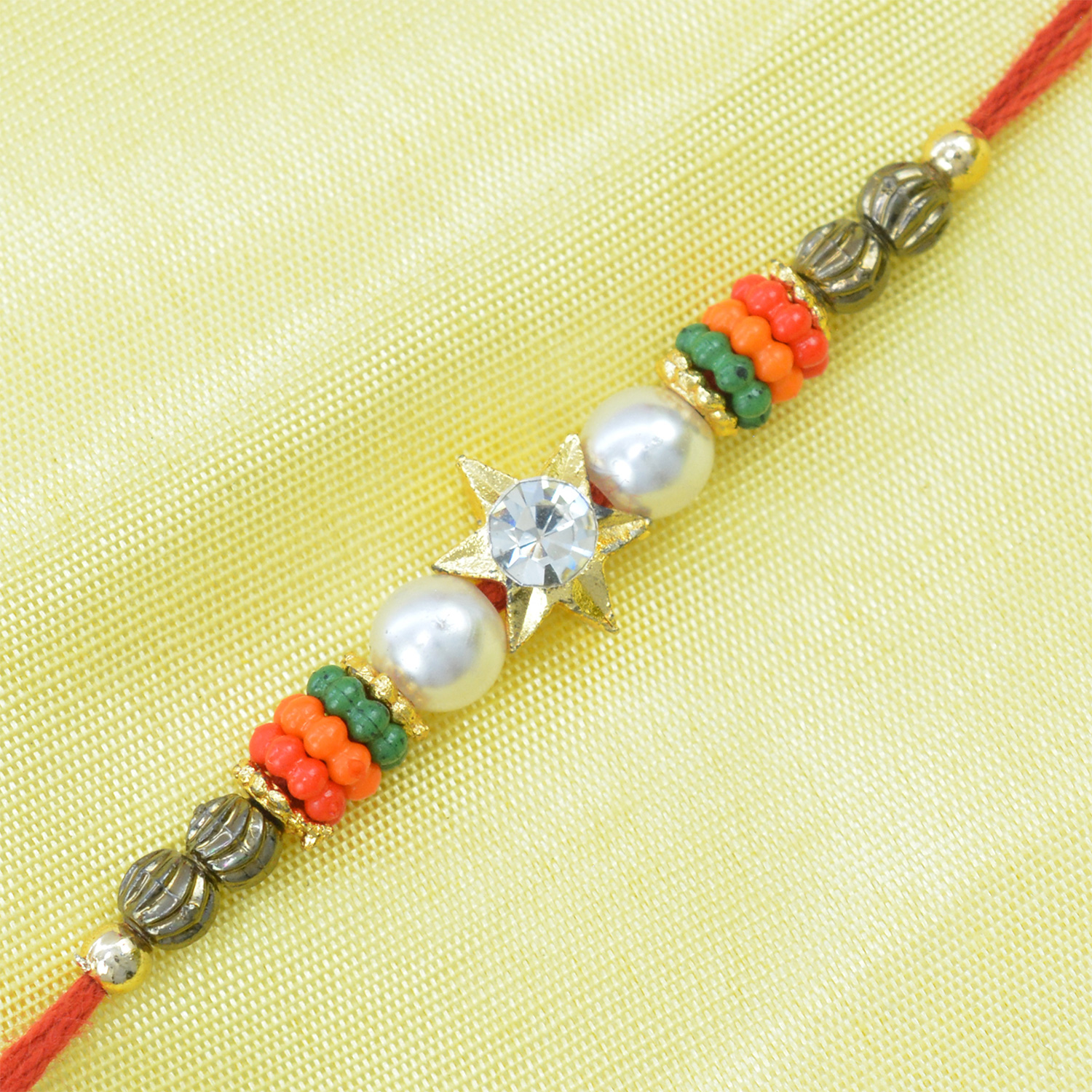 Diamond on Star in the Middle Thread Beads Rakhi