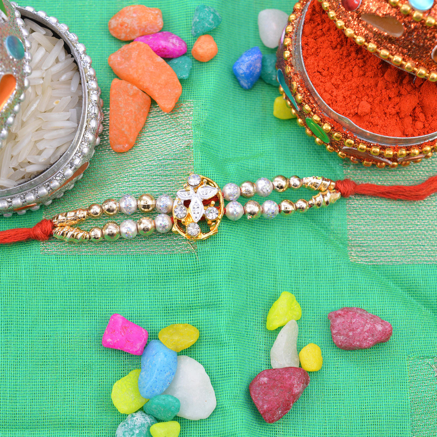 Silver and Golden Color leaves in Middle Beads Rakhi
