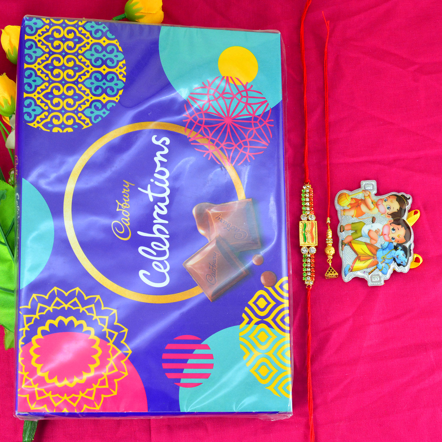 Golden Bhaiya and Bhabhi Rakhi Set with Kid and Cadbury Celebration Small