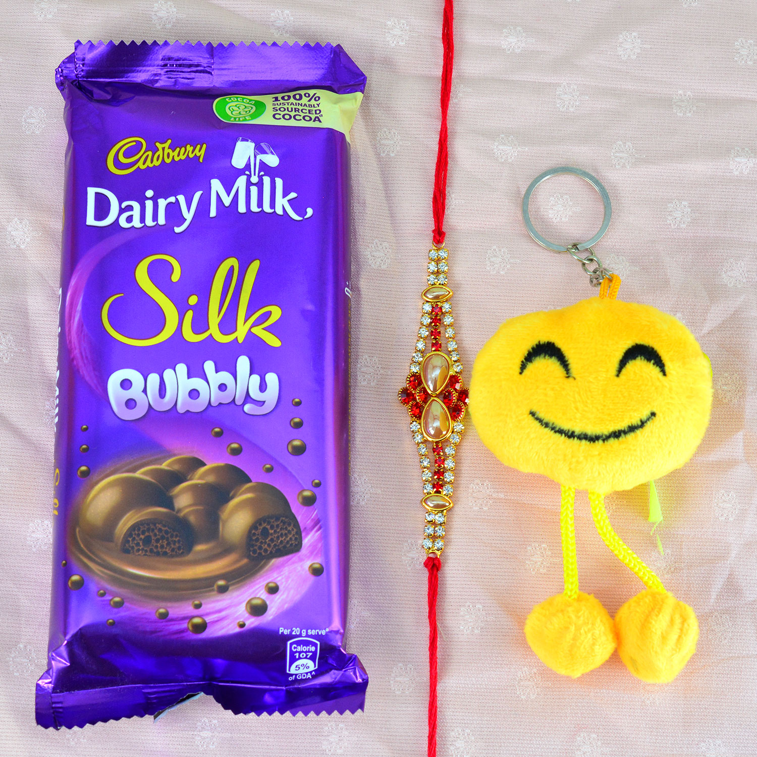 Smiley Kid Rakhi with Brother Rakhi and Silk Bubbly Chocolate