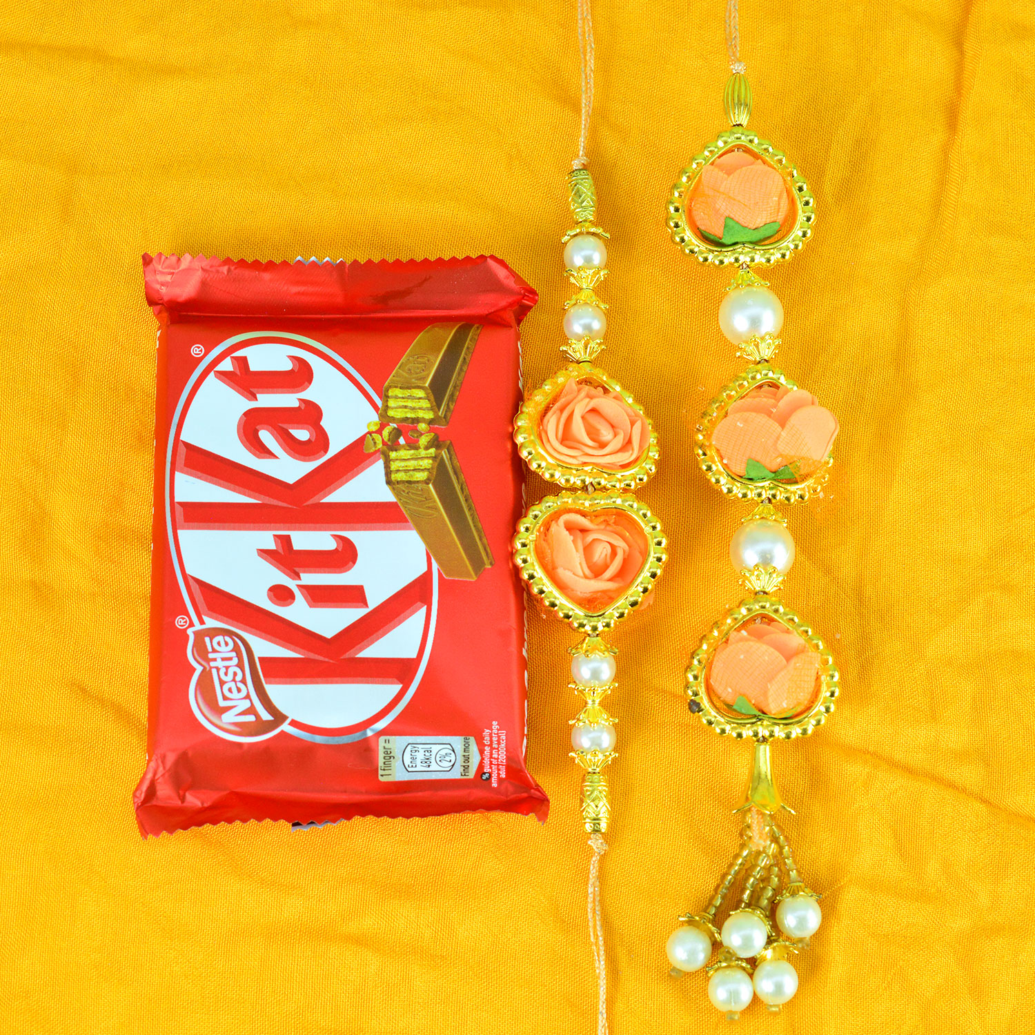 Floral Shape Bhaiya Bhabhi Rakhi Set with Tasty Nestle Kitkat Small