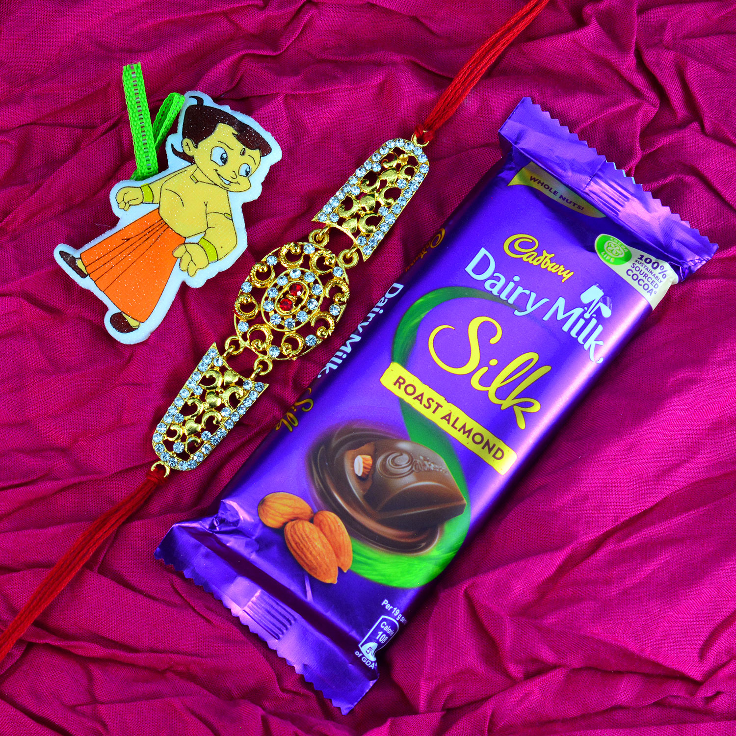 1 Kid and 1 Designer Rakhi for Brother with Dairy Milk Silk Roasted Almonds