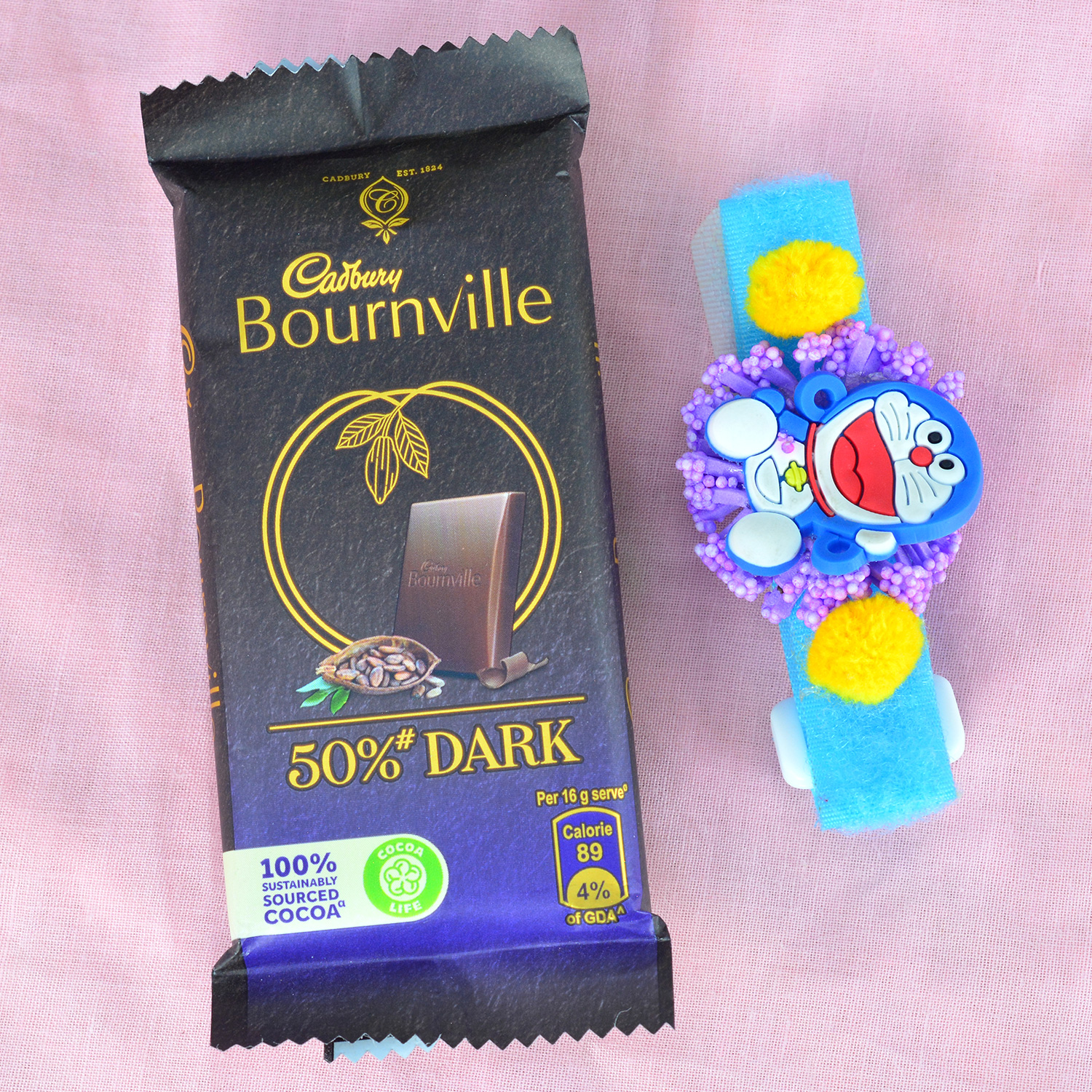 Doremon Kid Rakhi with Cadbury Small Bournville Chocolate