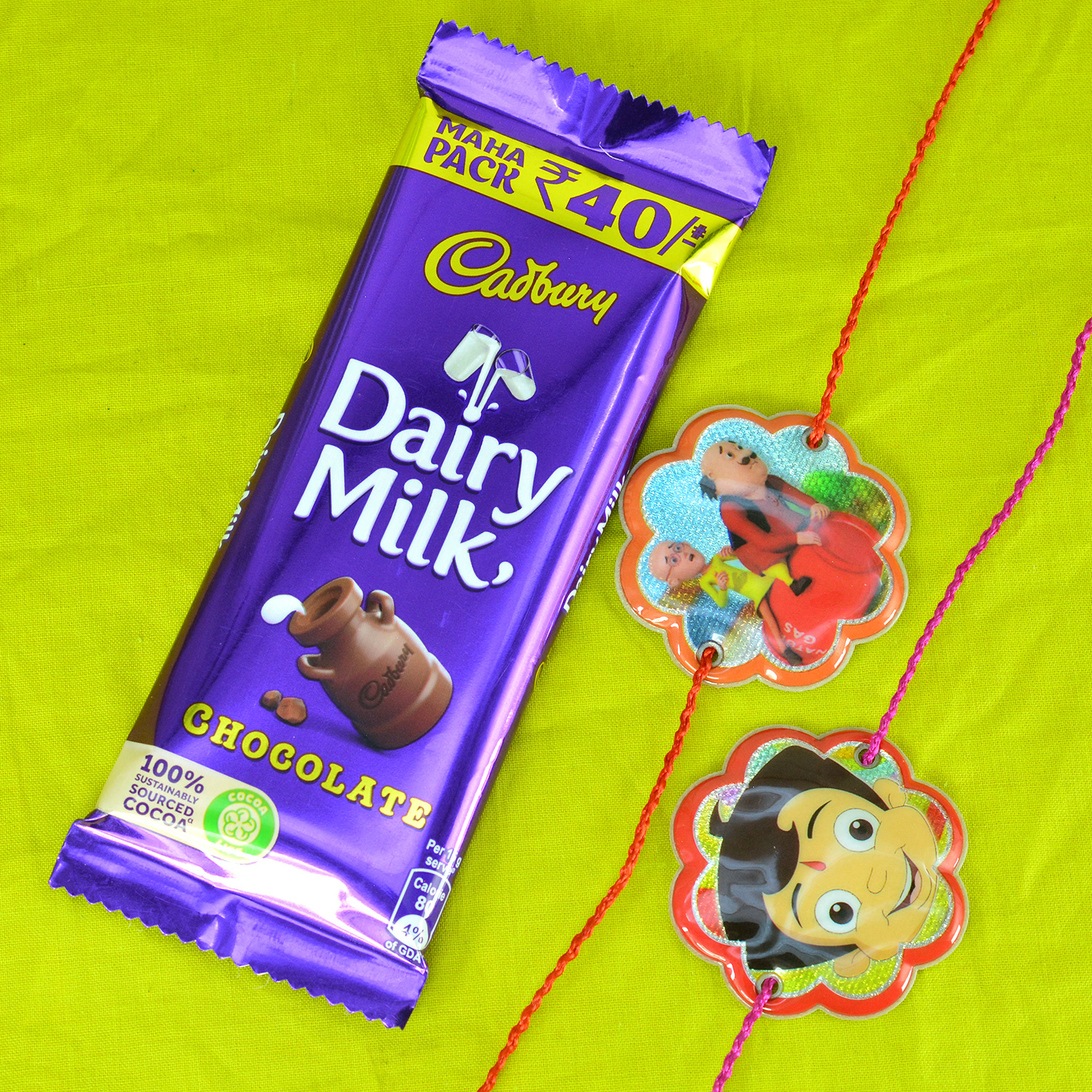 Small Tasty Dairy Milk with 2 Cartoon Kid Rakhis