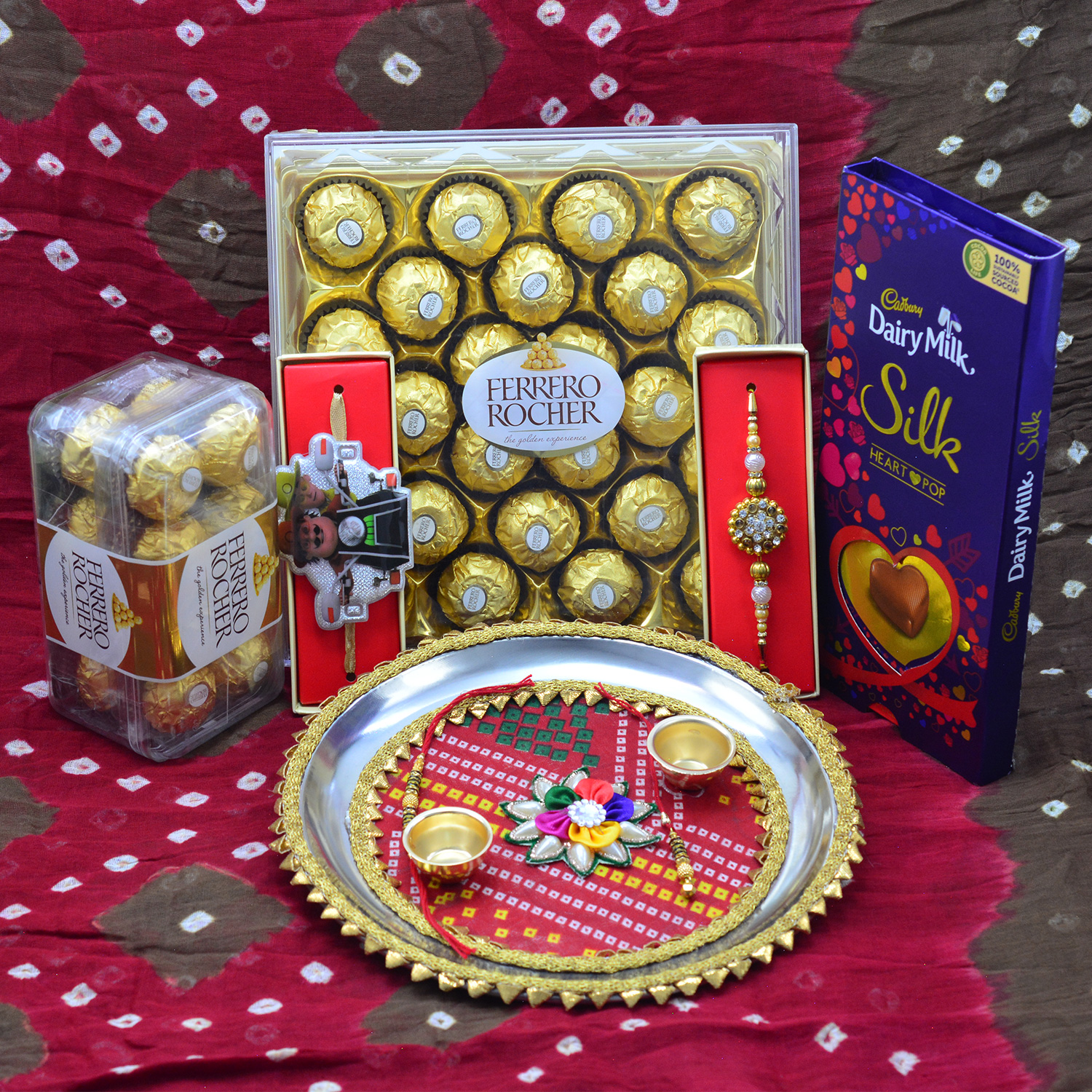 Lots of Ferrero Rocher Chocolates with Dairy Milk Silk and Pleasant Rakhi Pooja Thali 
