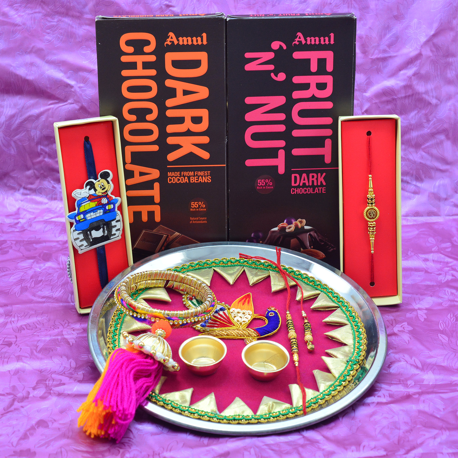 Amul Chocolates Combo with Amazing Rakhis and Pink Base Stunning Looking Pooja Thali Hamper