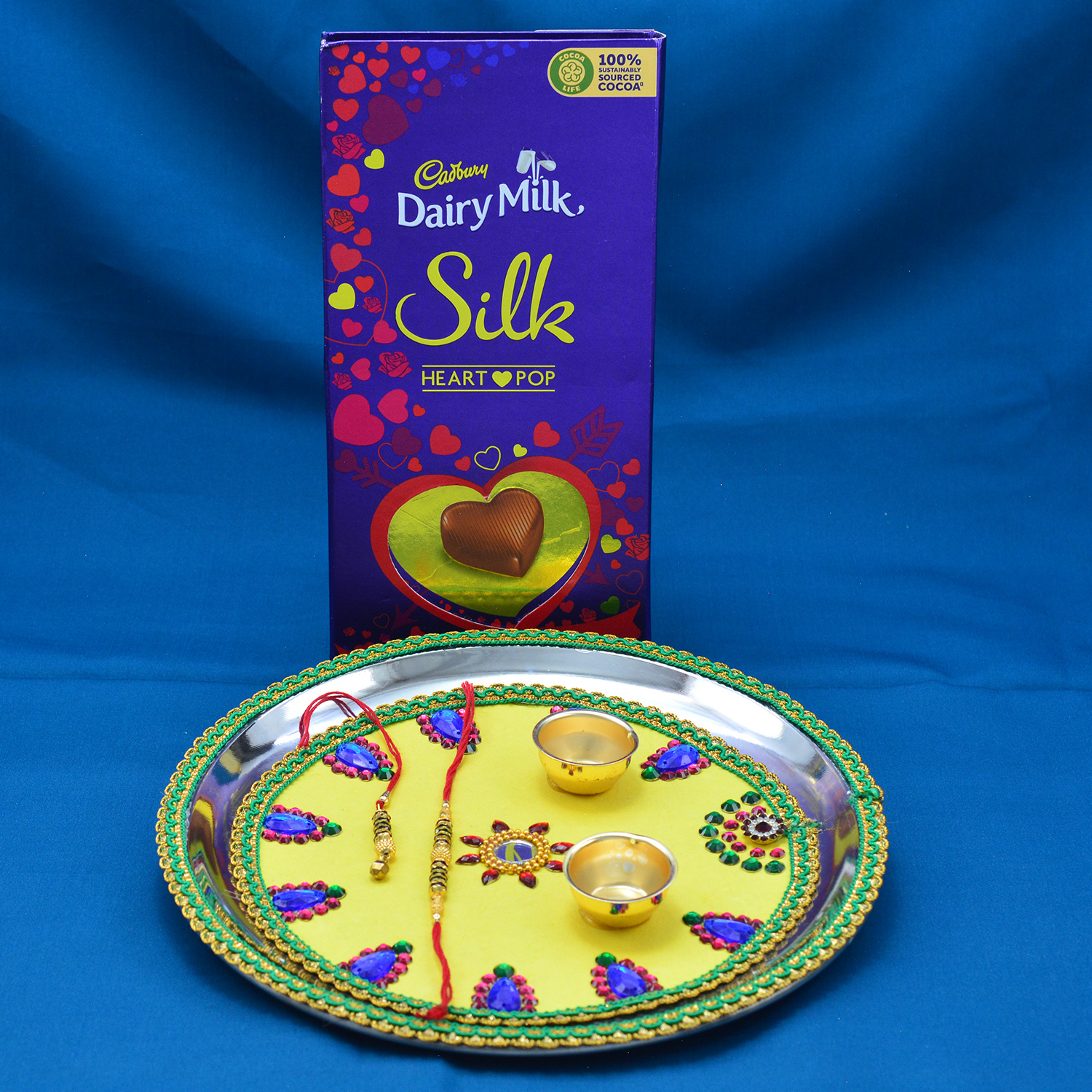 Cadbury Silk Heart Pop Chocolate with Marvelous Looking Light Yellow Rakhi Pooja Thali