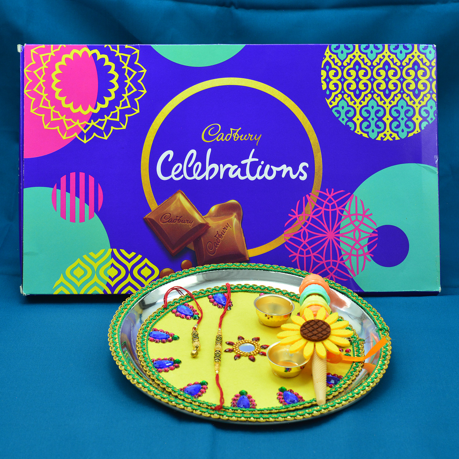 Cadbury Celebration Big with Amazing Looking Yellow Base Rakhi Puja Thali Hamper