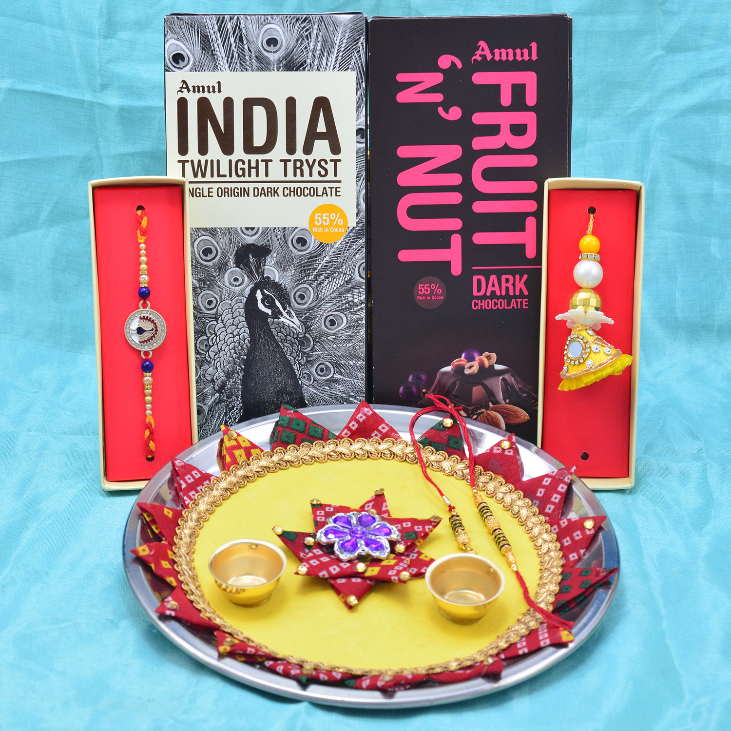 Amul Fruit and Nut with Twilight Tryst Chocolates Hamper with Stunning Looking Yellow Rakhi Puja Thali