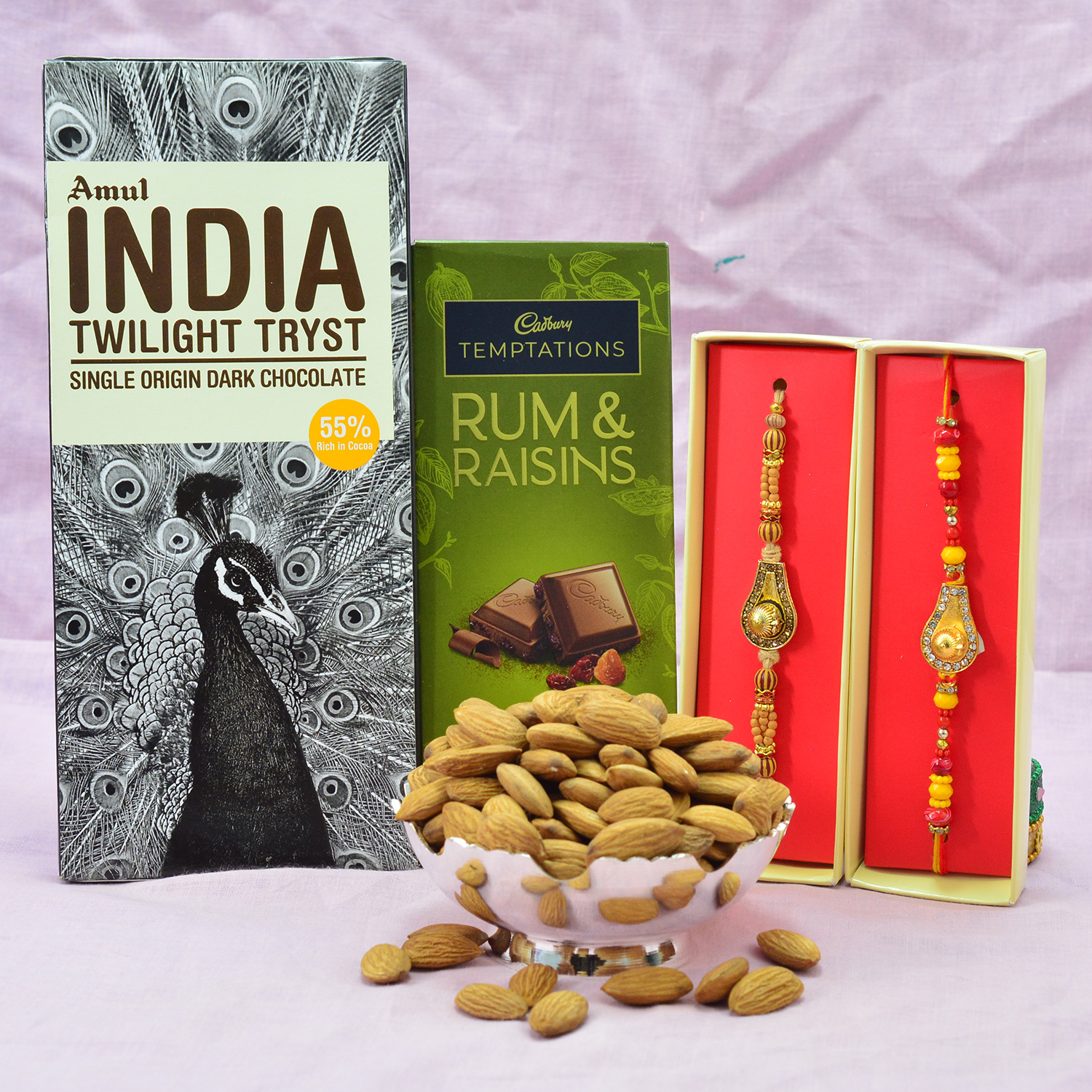 Rum Raisins Temptation with Amul Twilight Tryst Chocolate and Amazing Brother Rakhis with Dry Fruits Hampers
