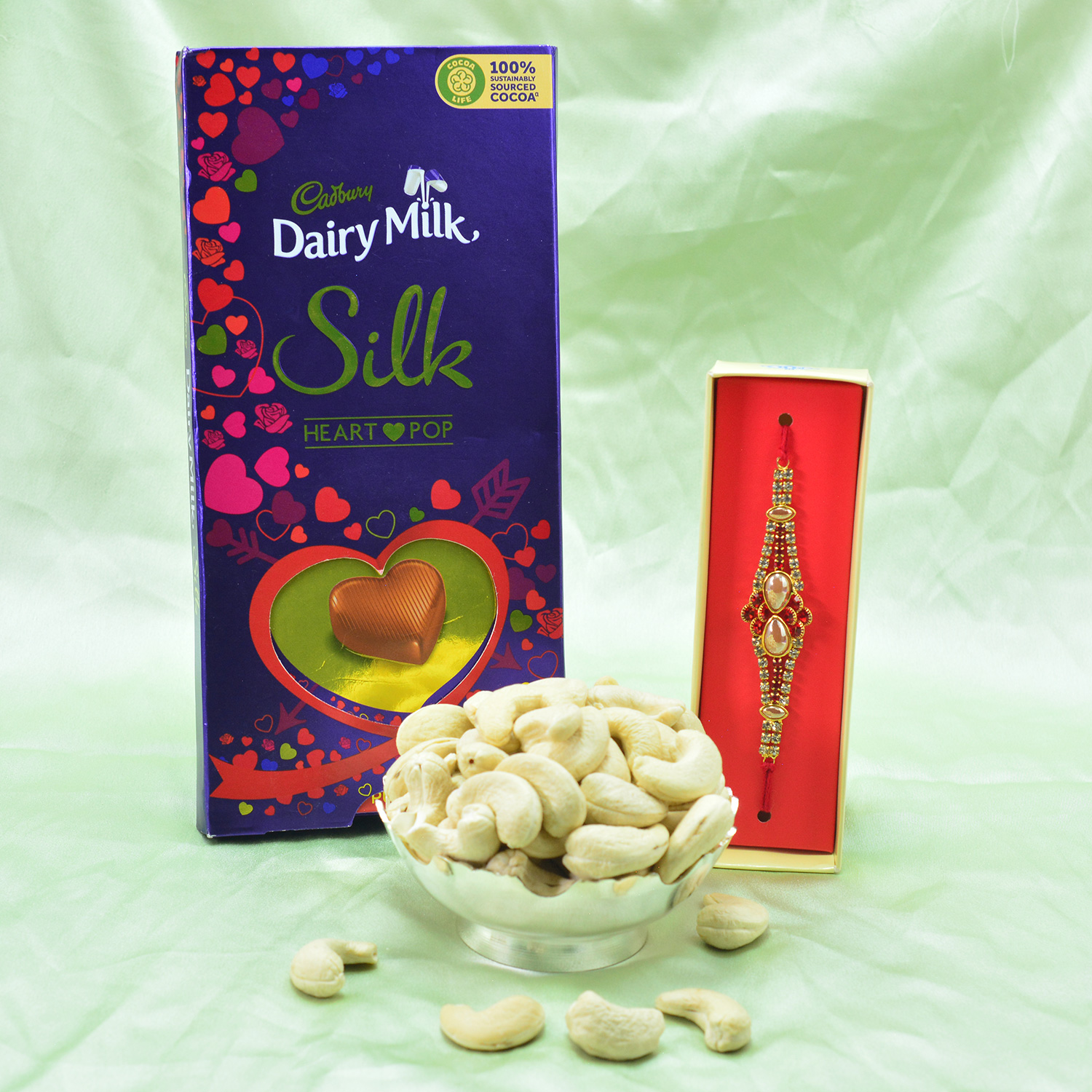 New Cadbury Dairy Milk Silk Edition with Special Jewel Brother Rakhi and Kaju Dry Fruit Hamper