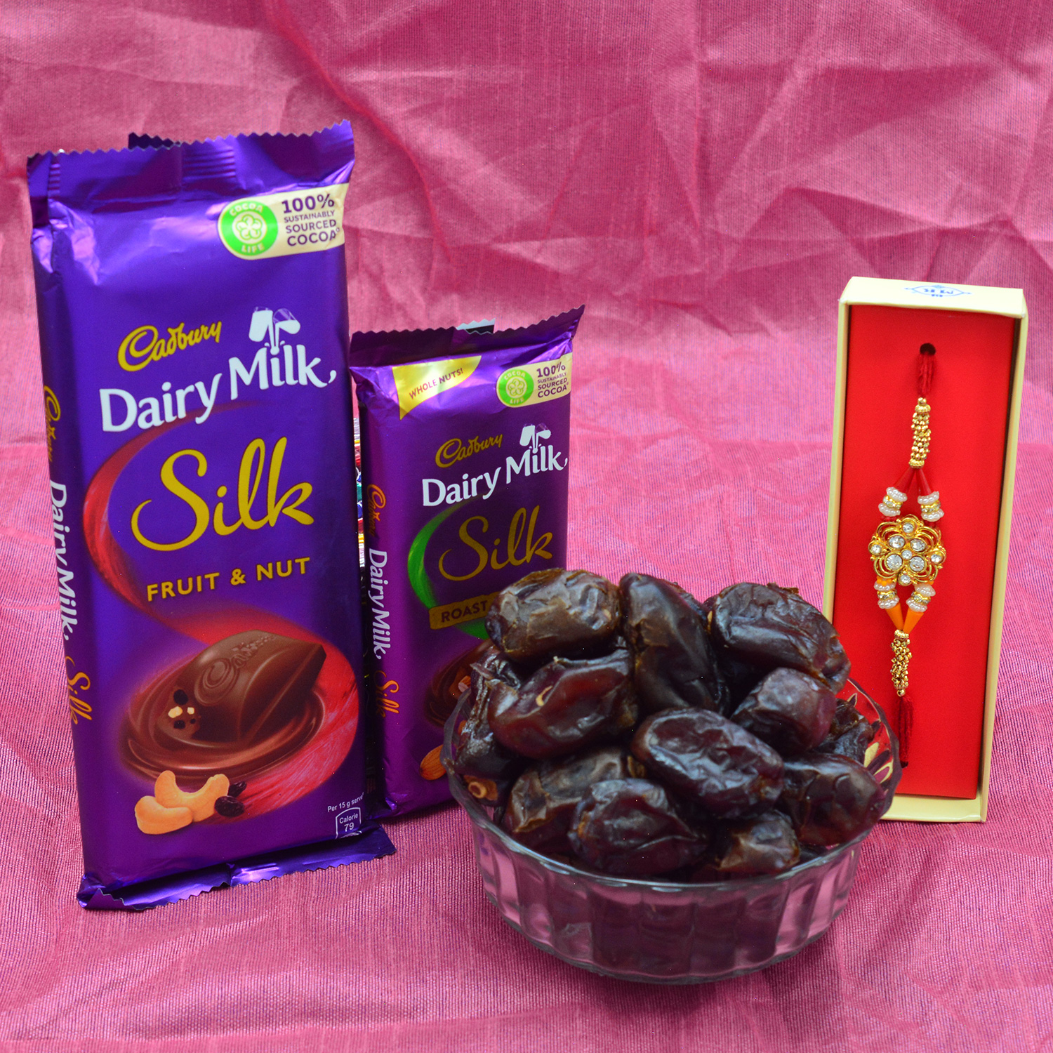 Dairy Milk Pair of Silk Chocolate with 1 Fancy Brother Rakhi and Pind Khajoor Dry Fruit