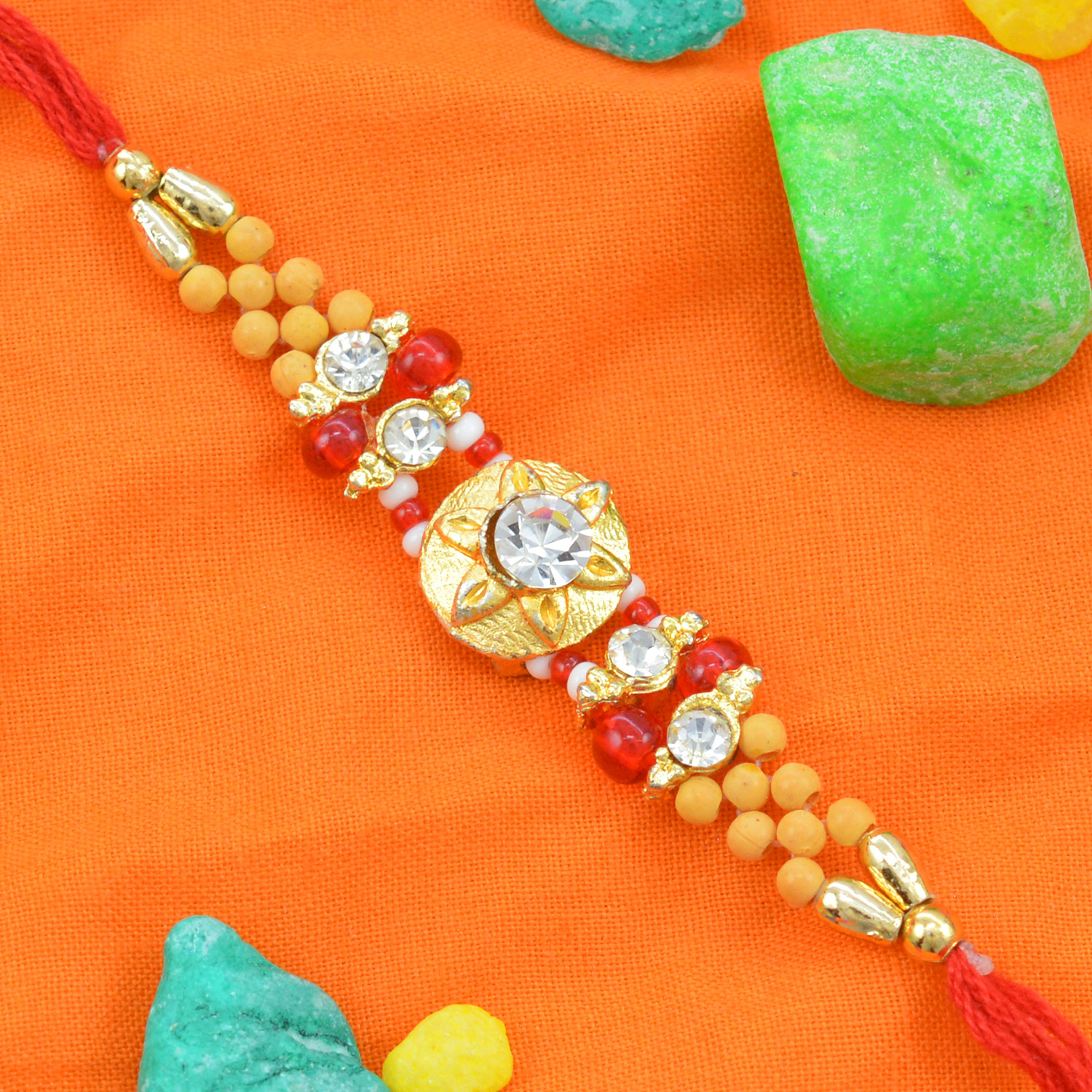 Small and Elegant looking on Hand Multi Beaded Rakhi for Brother