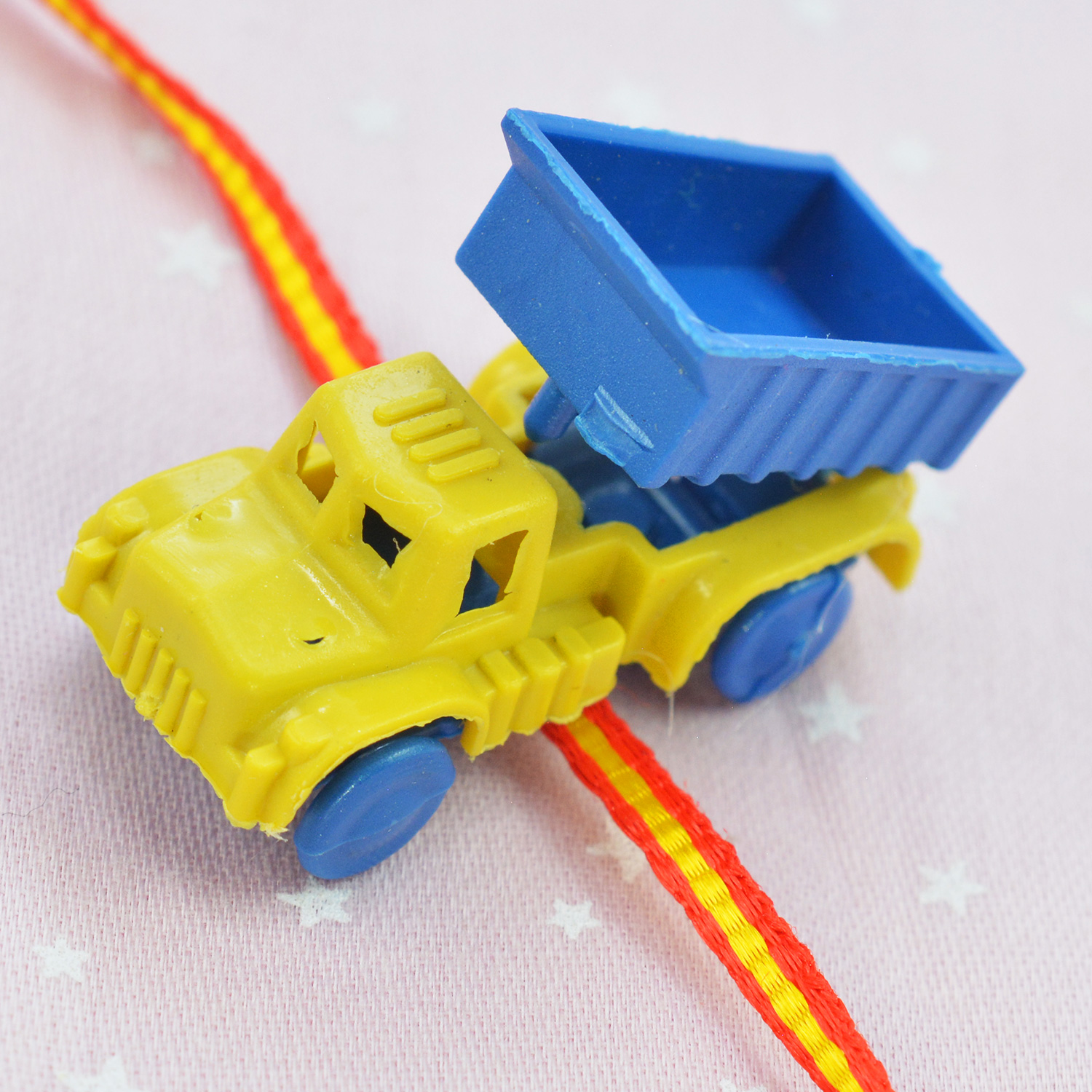 Toy Yellow Heavy Loading Truck Rakhi for Kids