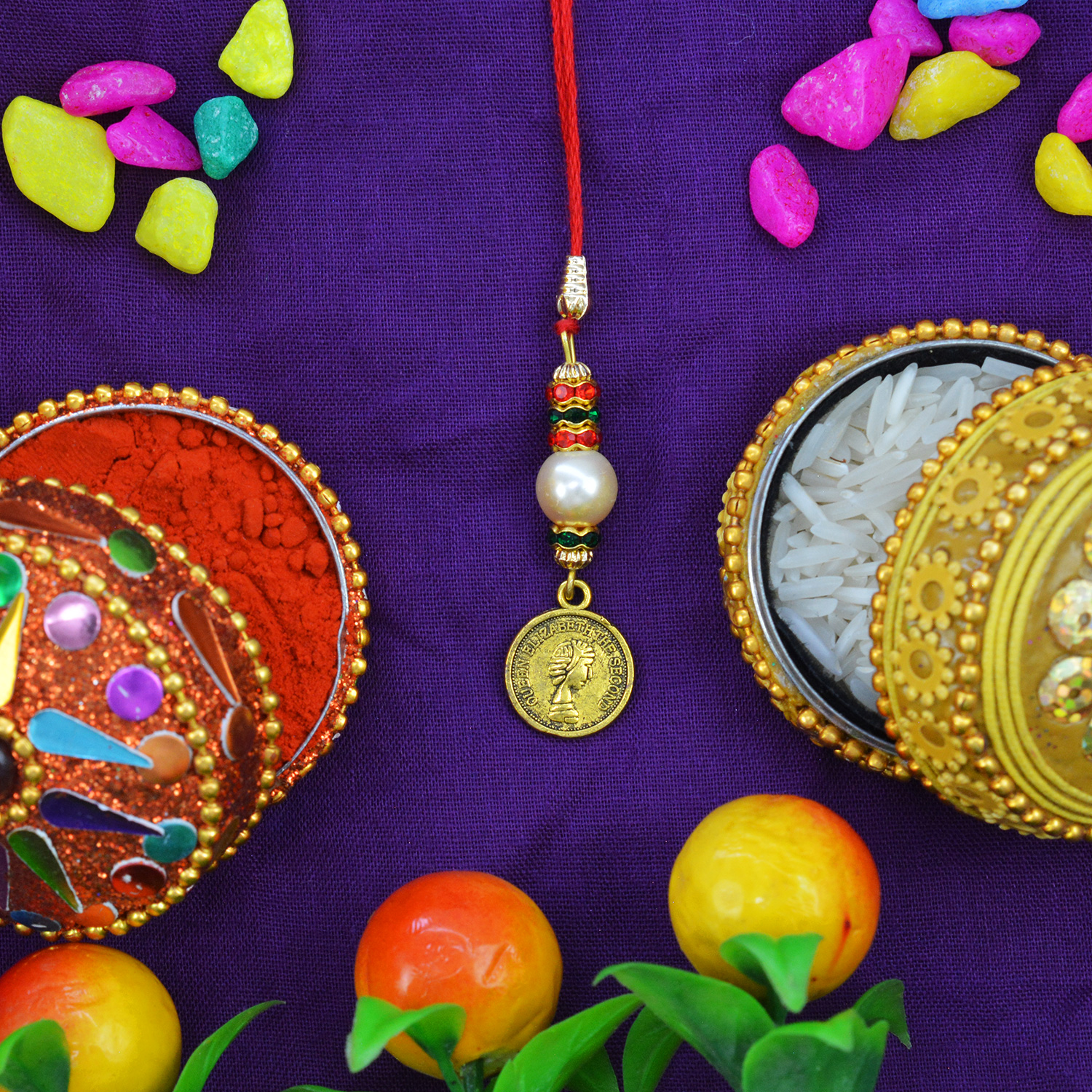 Elegant Looking Golden Coin of Queen Hanging Lumba Rakhi for Bhabhi