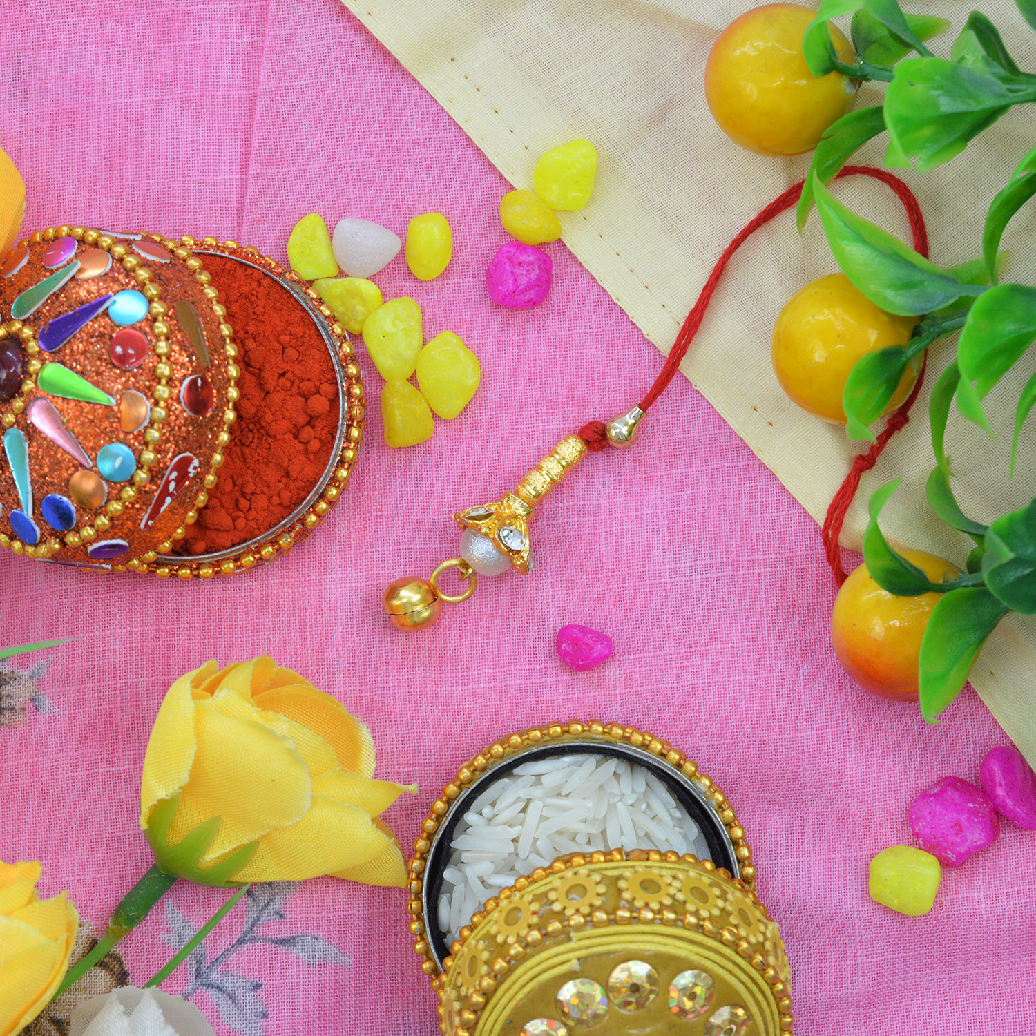 Impressive Golden Colored White Bead Lumba Rakhi for Bhabhi
