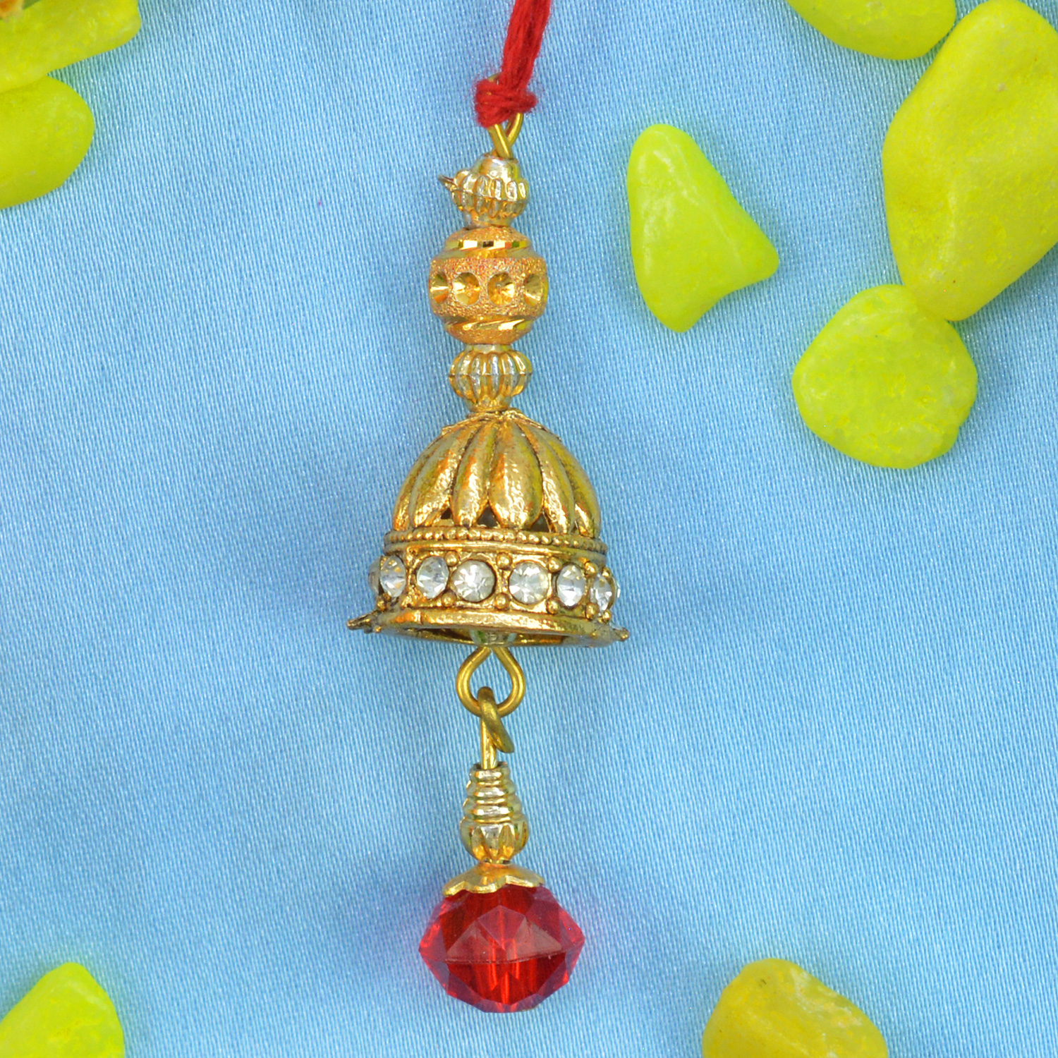 Red Colored Well Shaped Bead Hanging on Jhumka Type Lumba Rakhi