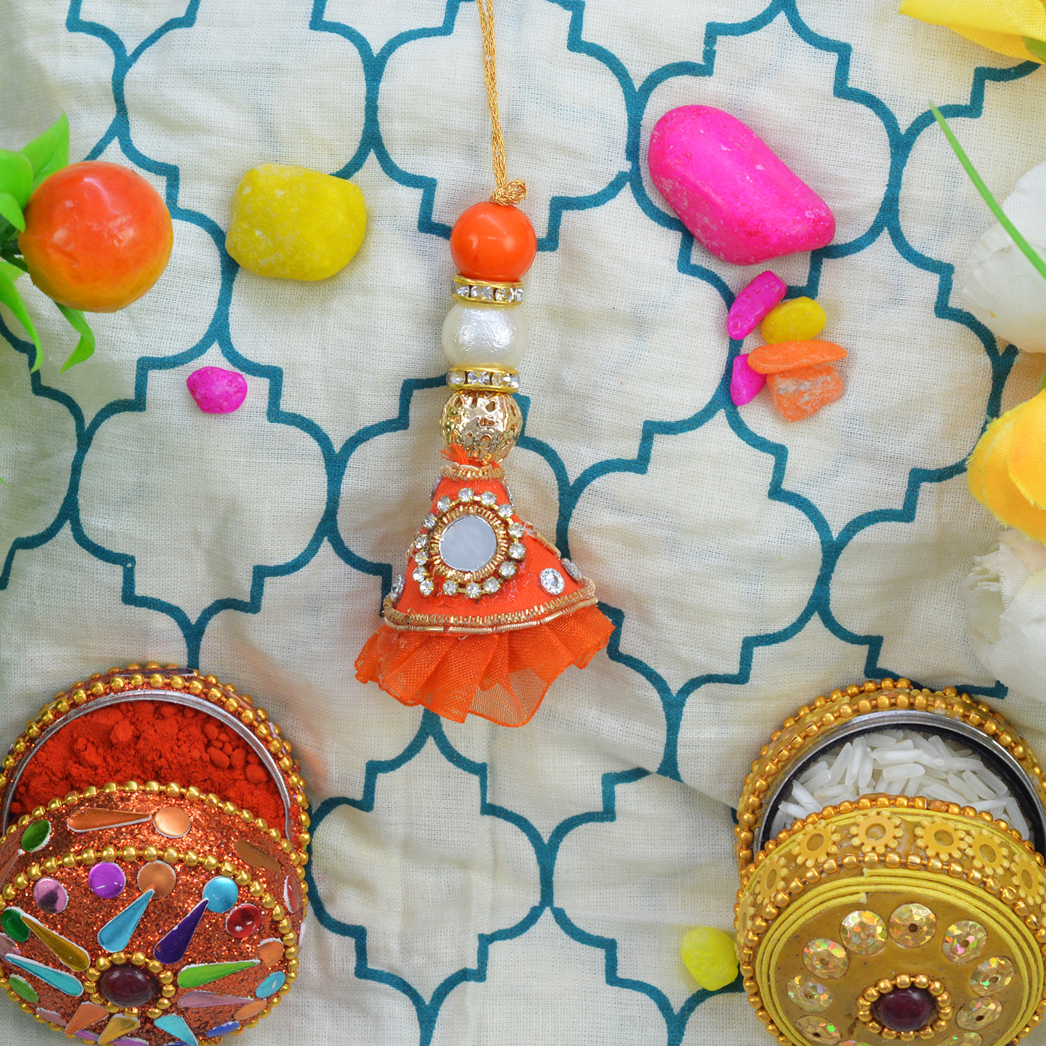 Multiple Colored Beads Looking Nice On Orange Retro Design Lumba Rakhi