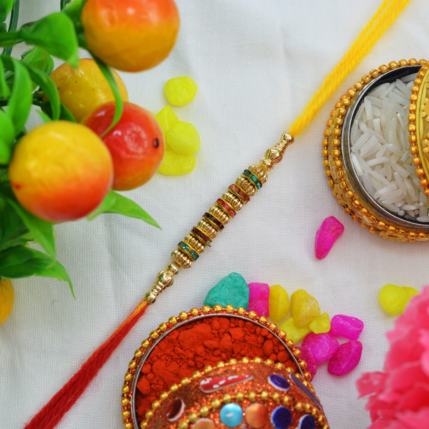 Stunning Multi-Color Diamonds Moli Rakhi with Eye-Catching Colorful Silk Thread