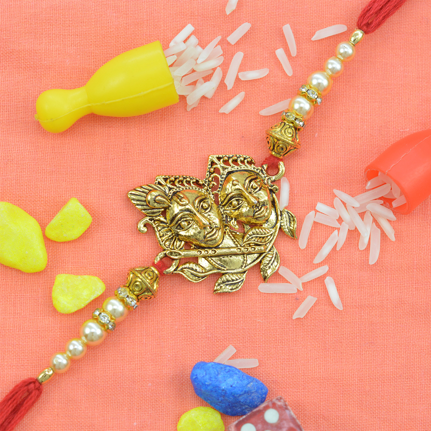 Amazing Radha-Krishna Pearl Rakhi with Golden Beads 