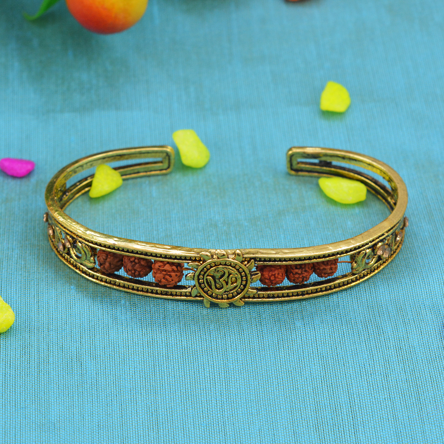 Prodigious Golden OM with Unique Rudraksha Rakhi Bracelet