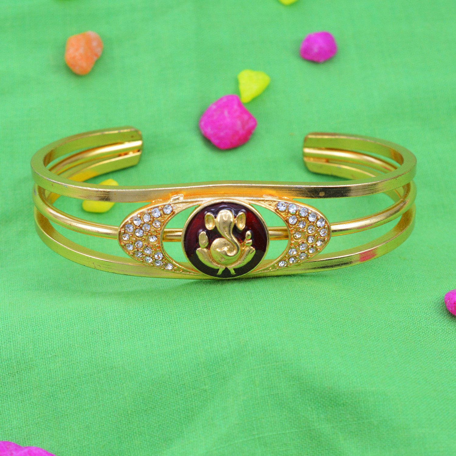 Marvelous Golden Ganesh Rakhi Bracelet with Graceful White Diamonds