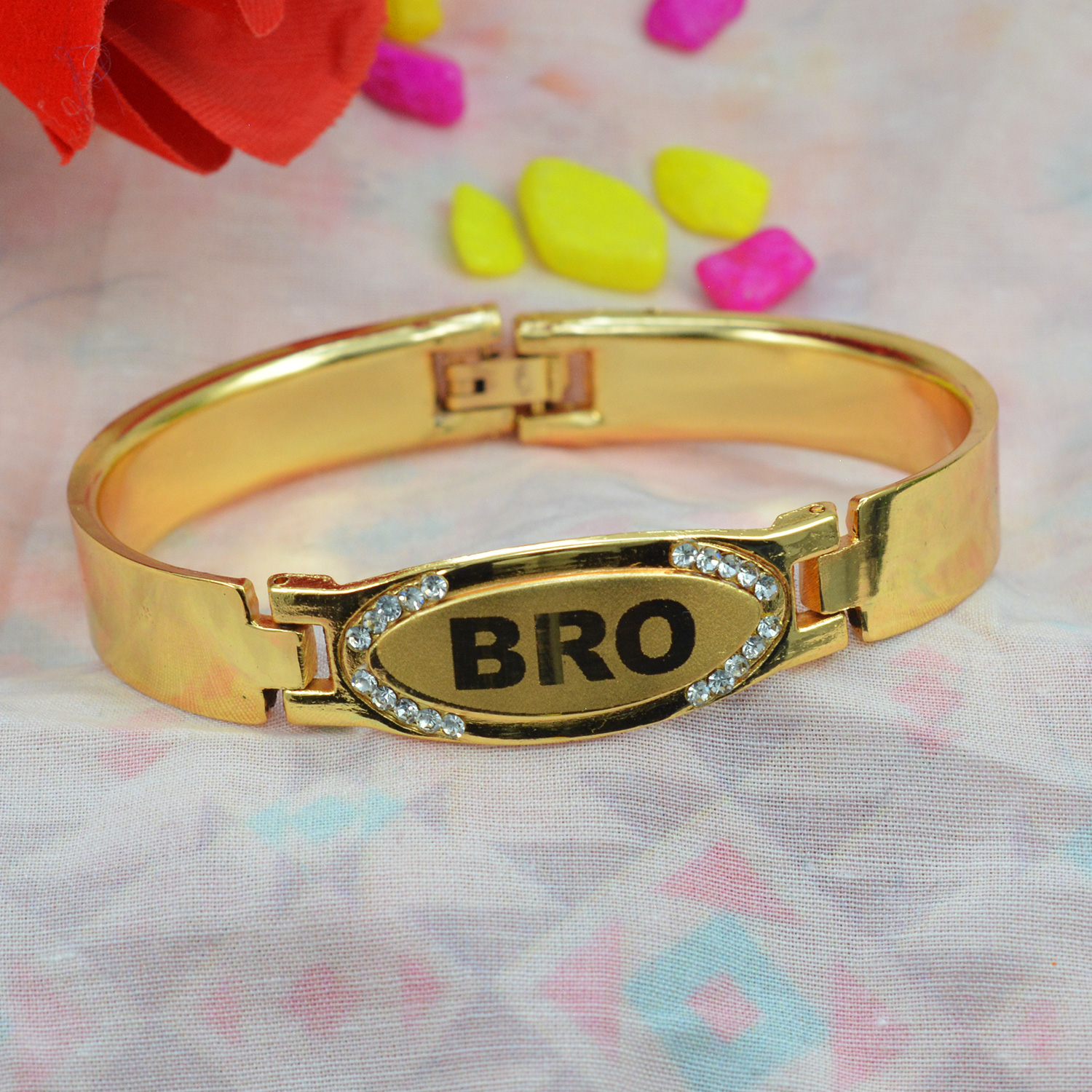 Beautiful Golden Oval Bro Rakhi Bracelet and Shining Diamonds