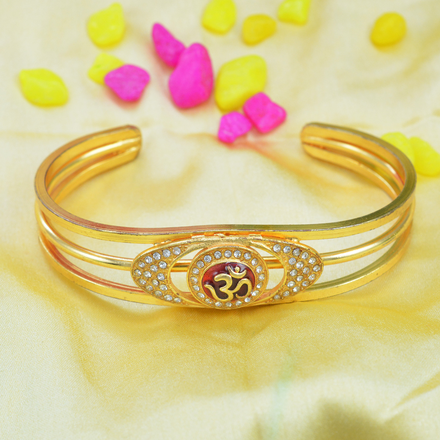 Fascinating and Shining Oval Diamonds OM Rakhi Bracelet