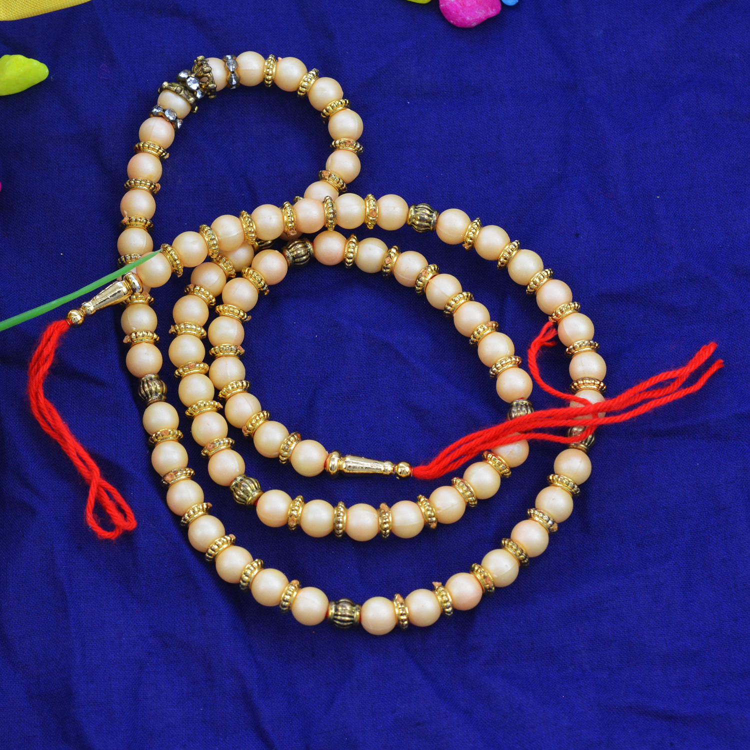 Beautiful and Marvelous Golden Pearls Garland with Red Silk Thread