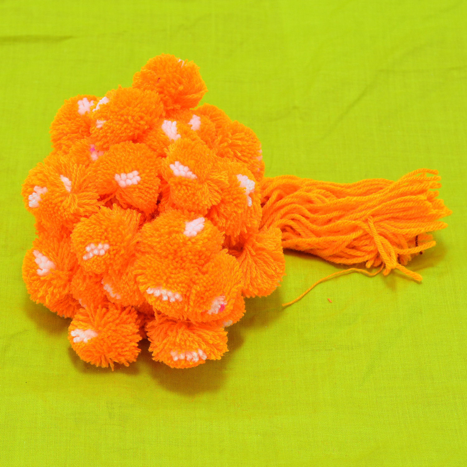 Orange Color while Dot Divine Ram Rakhi Pack of 20