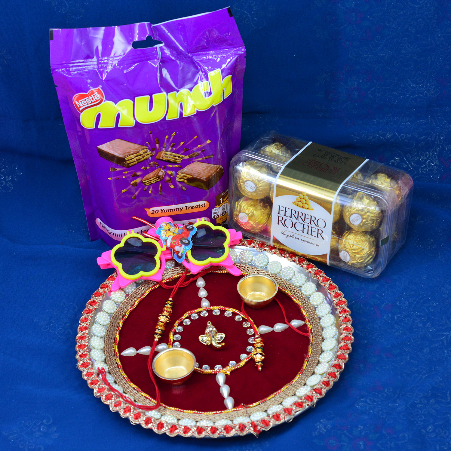 Pack of Munch Chocolates and Ferrero Rocher with Handcrafted Maroon Base Rakhi Puja Thali