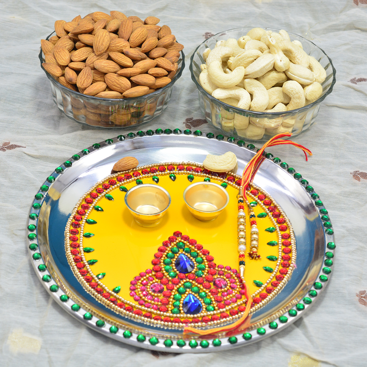 Kaju and Badam Dry Fruits with Awesome Looking Colorful Jewel Studded Rakhi Pooja Thali