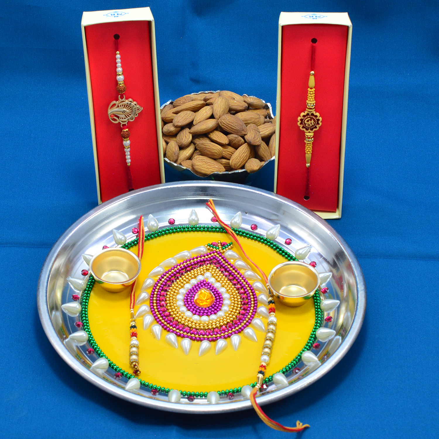 Amazing Yellow Base Crafted Pearl Pooja thali Rakhi with Delicious Almonds