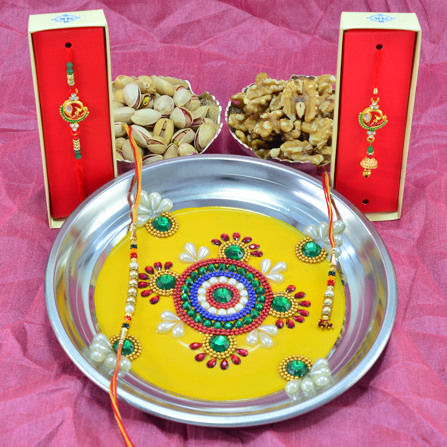 Wonderful Crafted Pooja Thali with Amazing Bhaiya Bhabhi Rakhi and Yummy Pista and Walnut Dry Fruits