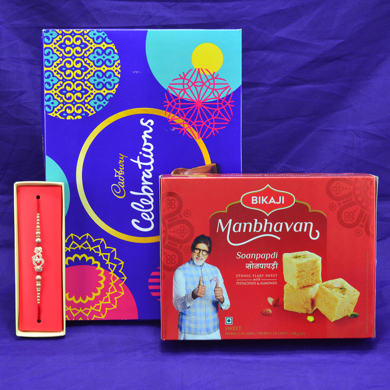Exclusive Divine OM Rakhi with Palatable Cadbury Celebration and Yummy Bikaji Soanpapdi