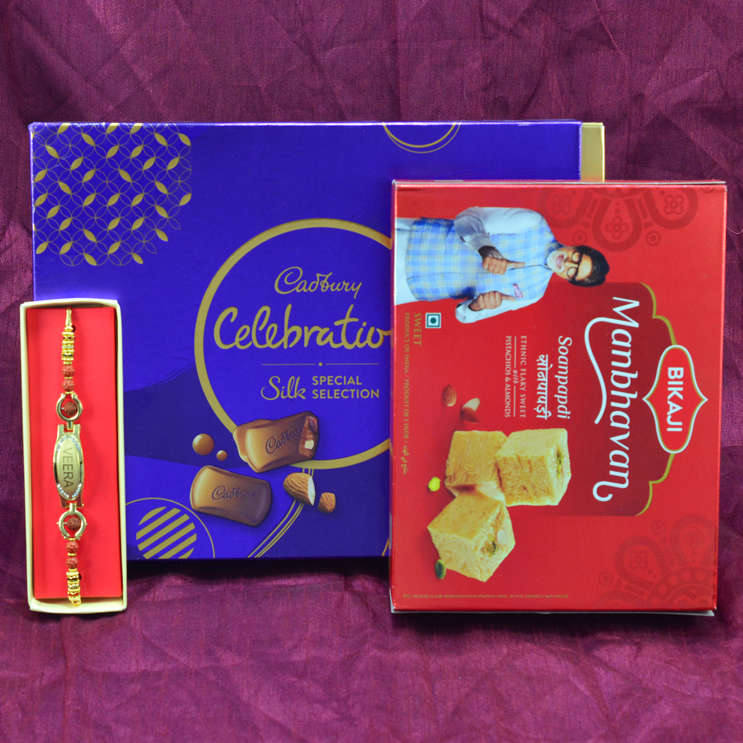 Amazing Veera Printed Rakhi with Luscious Cadbury Celebration and Bikaji Manbhavan Soanpapdi