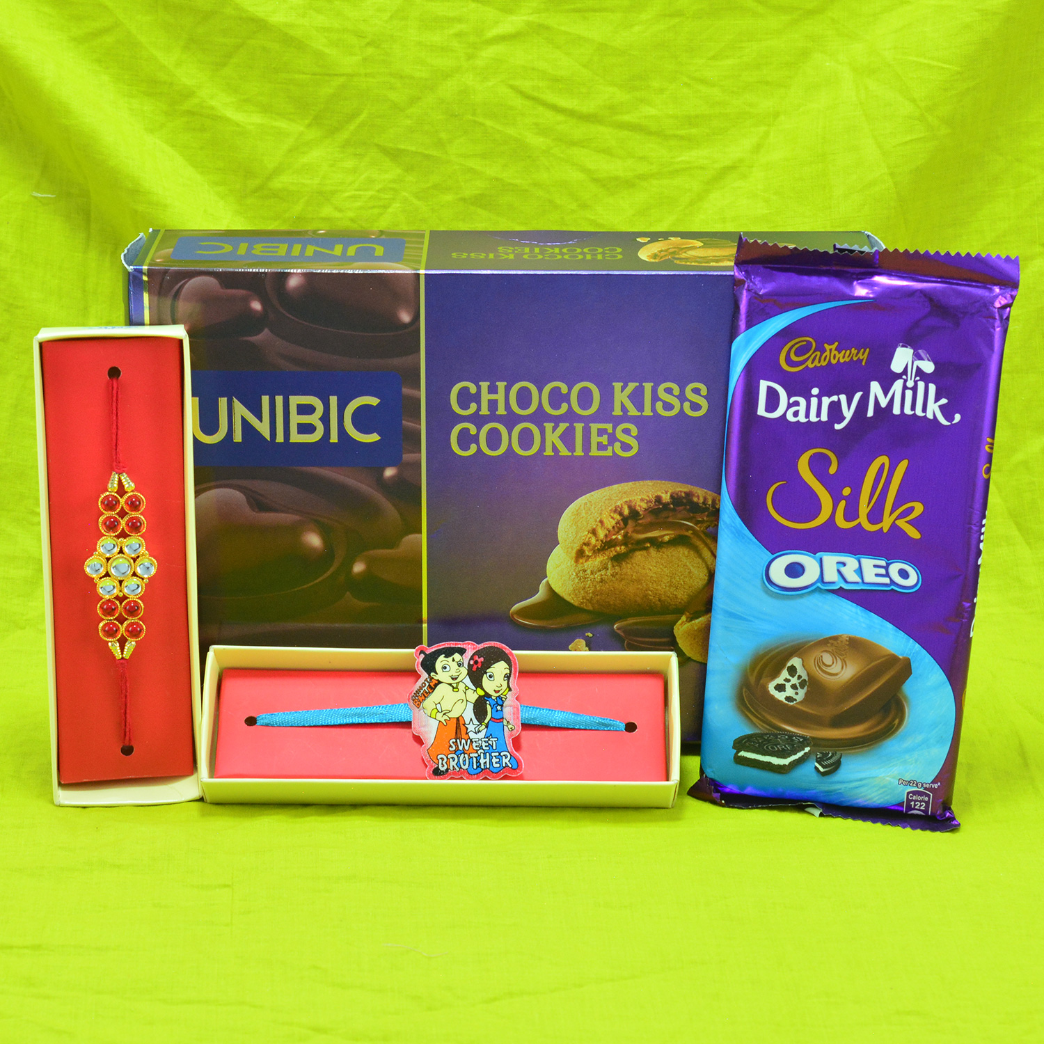 Amazing Multicolor Beads Rakhi with Kids Rakhi and Luscious Choco Kiss Cookies and Cadbury Dairy Milk Silk Oreo