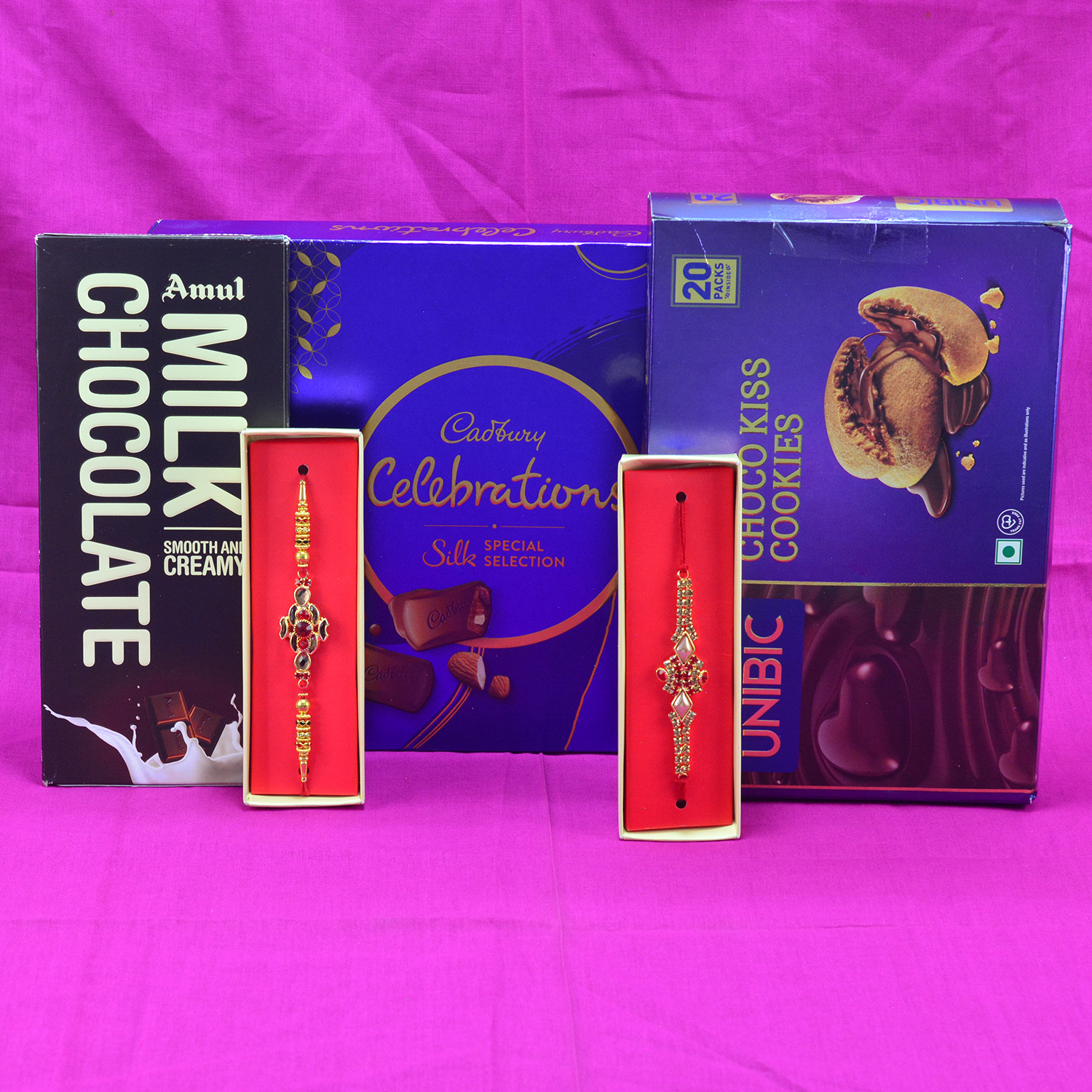 Attractive Jewel Rakhi with Tasty Amul Milk Chocolate and Cadbury Celebration with Choco Kiss Cookies