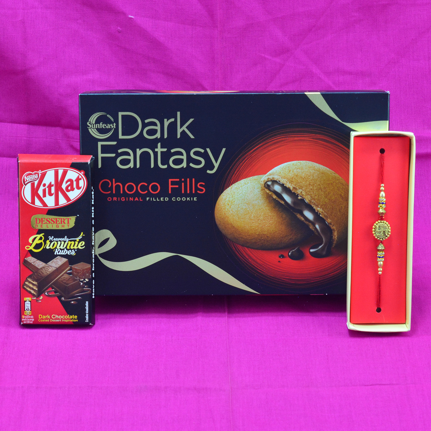 Wonderful Swastik Divine Rakhi wtih delightful Dark Fantasy Choco Fills and Kitkat Chocolate