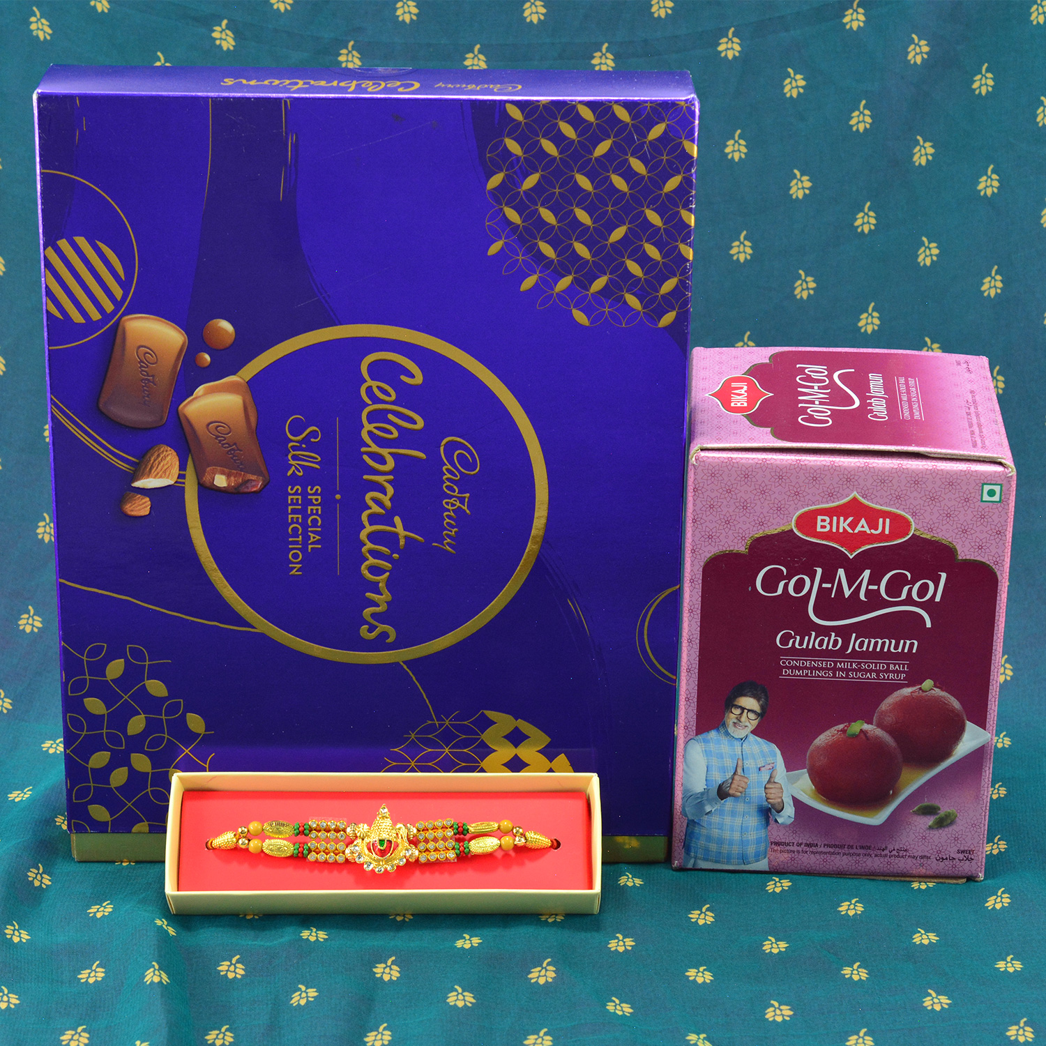 Marvellous Jewel Rakhi wtih mouthwatering Bikaji Gol Matol Gulab Jamun and luscious Cadbury Celebrations
