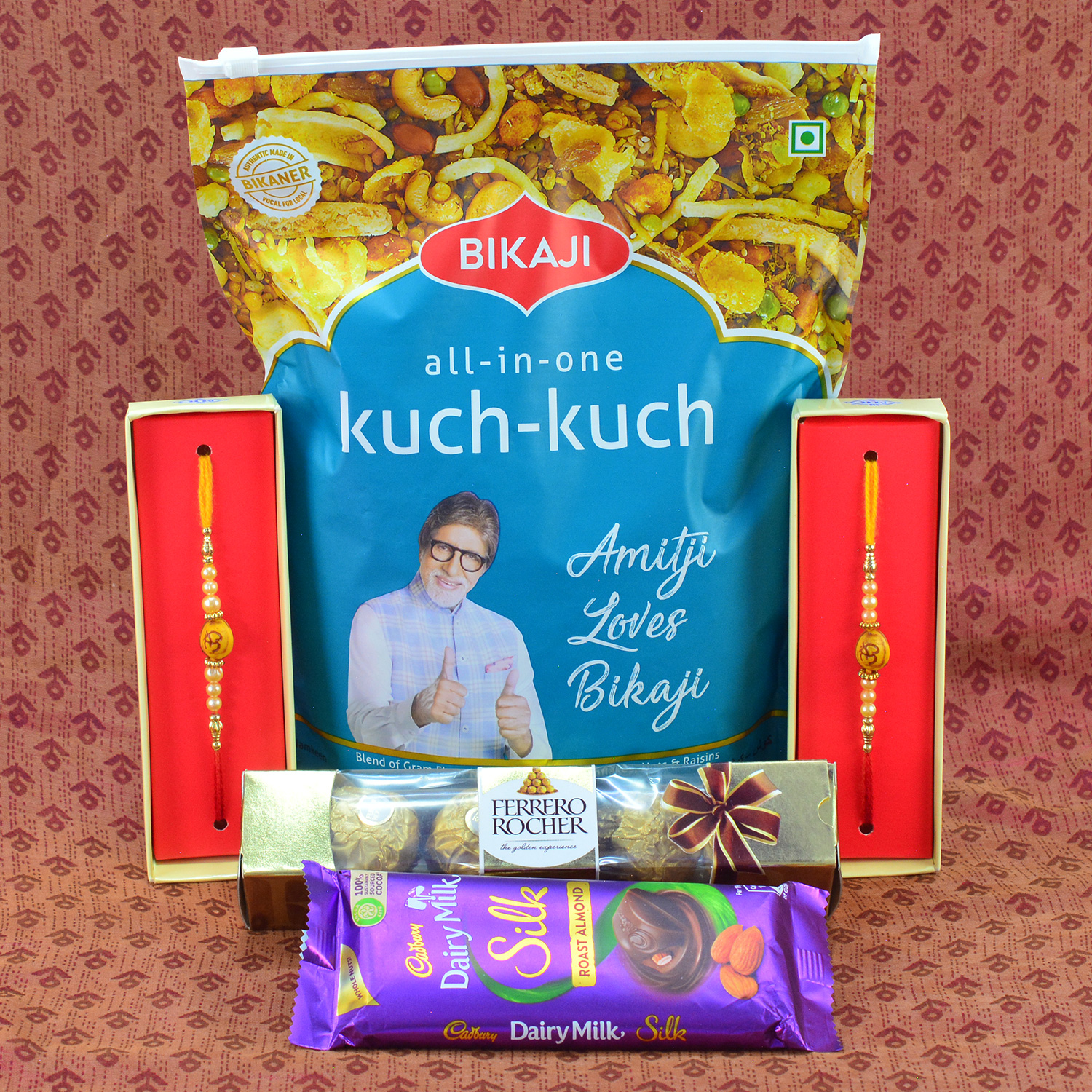 Marvellous 2 Pear Rakhi with Awesome Dairy Milk with Ferrero Rocher and acrid Bikaji all in one kuch kuch