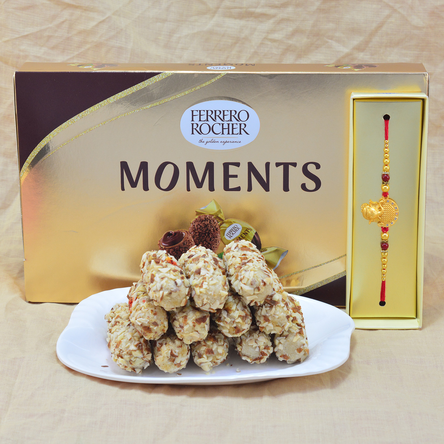 Mouthwatering Ferrero Rocher with Delicious Kaju Butterscotch Roll with Awesome Jewel Rakhi