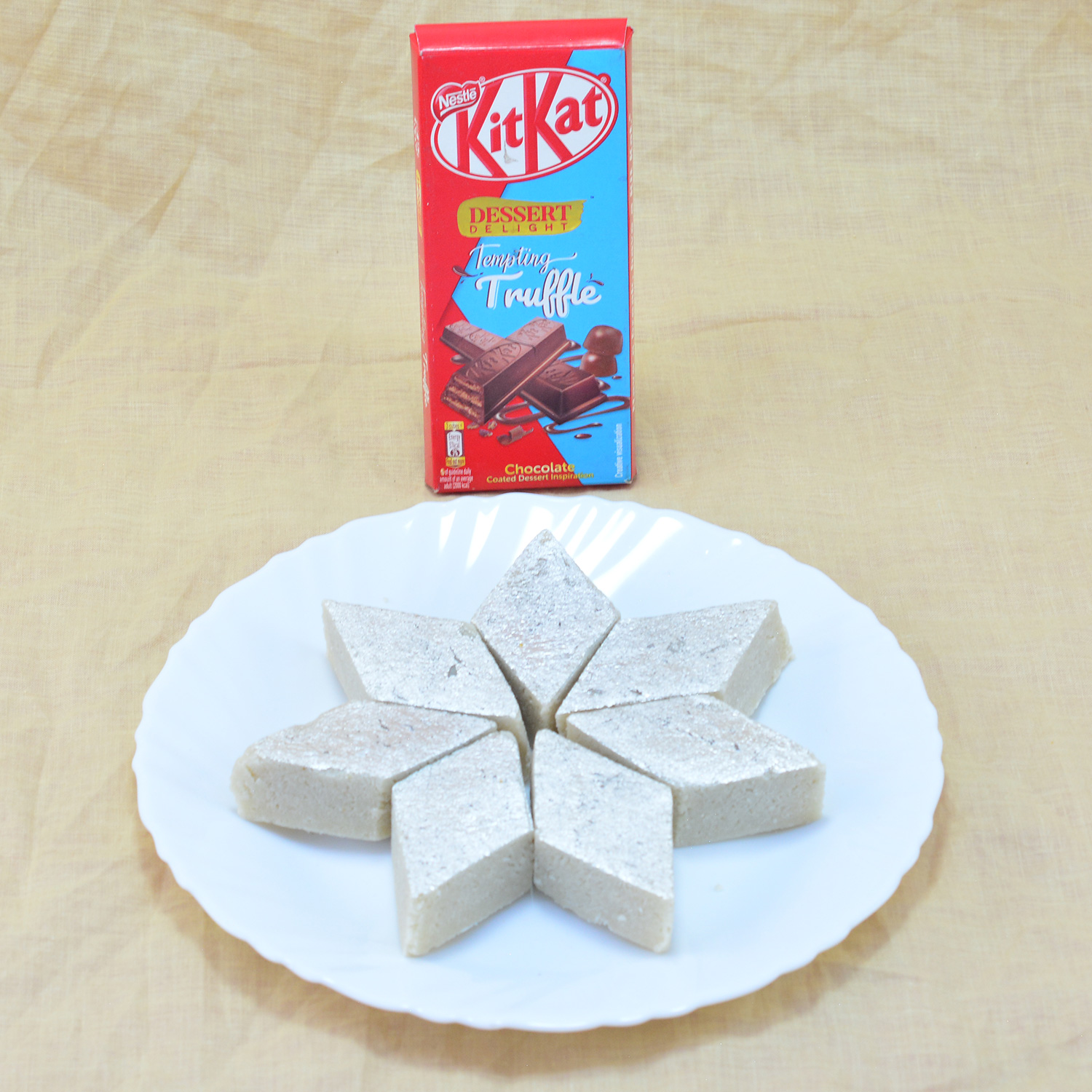 Delicious Kaju Katli with Yummy Nestle Kitkat Hamper