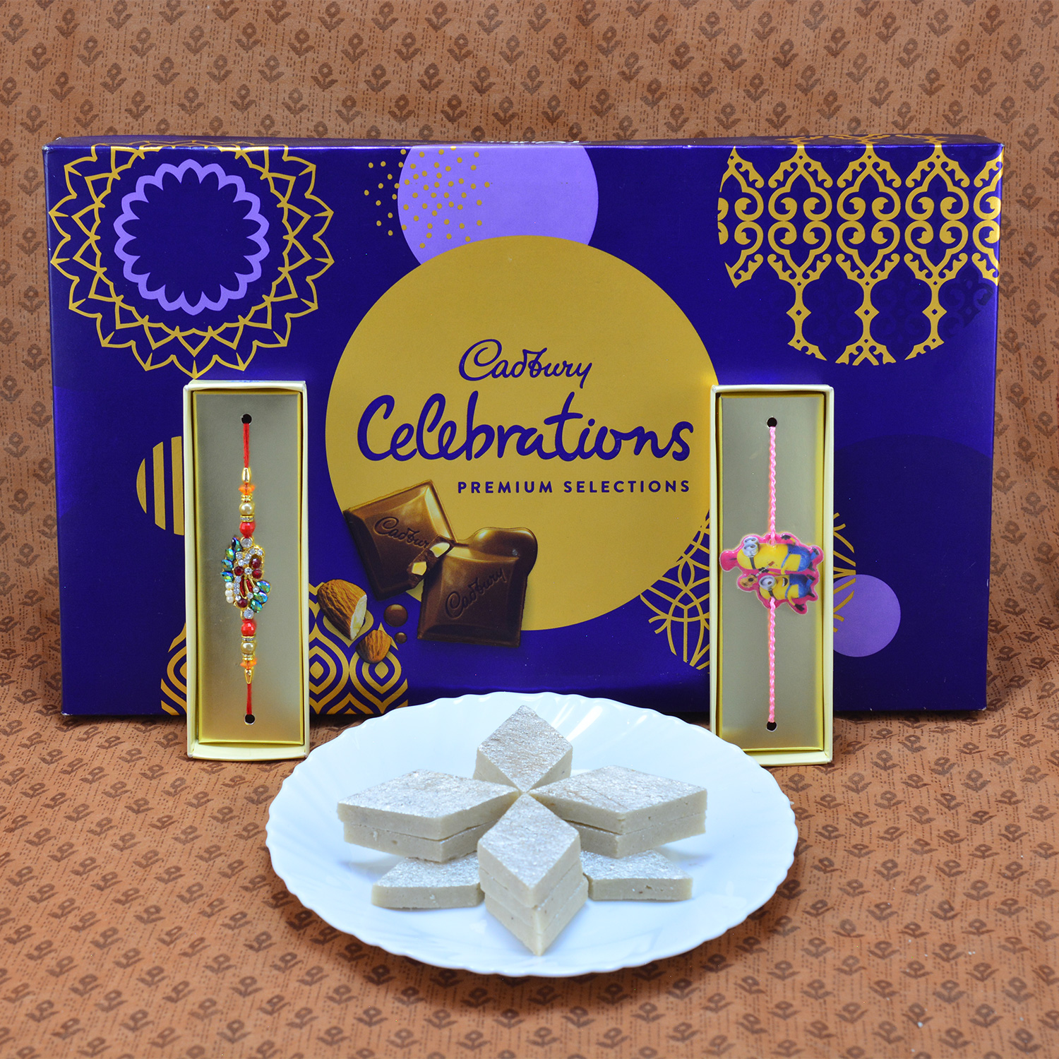 Condimental Kaju Katli with Yummy Cadbury Celebrations and Stunning Rich Look Rakhi Hampers